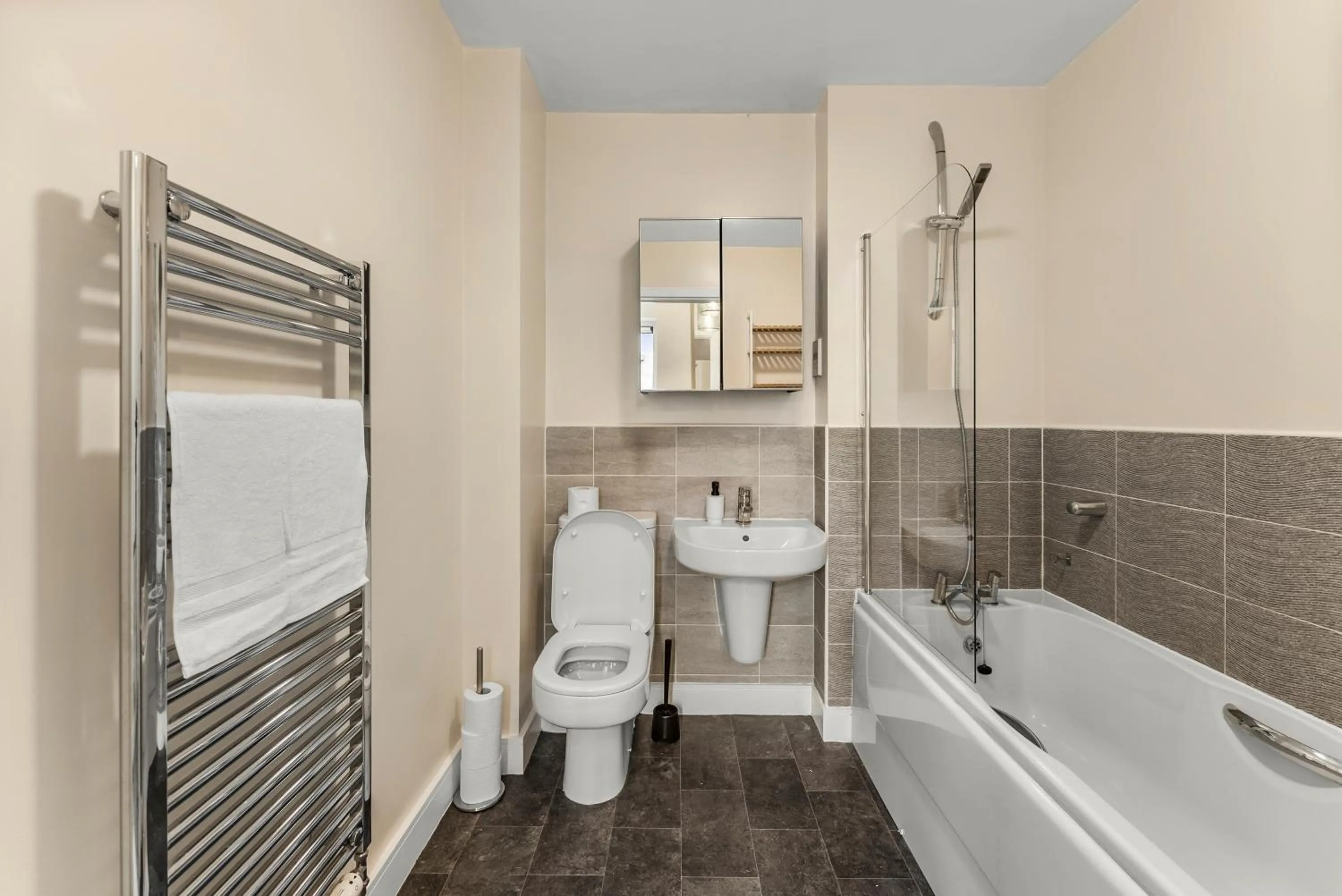 Bathroom in Sleek and Stylish 2 Bed with Garden and Parking