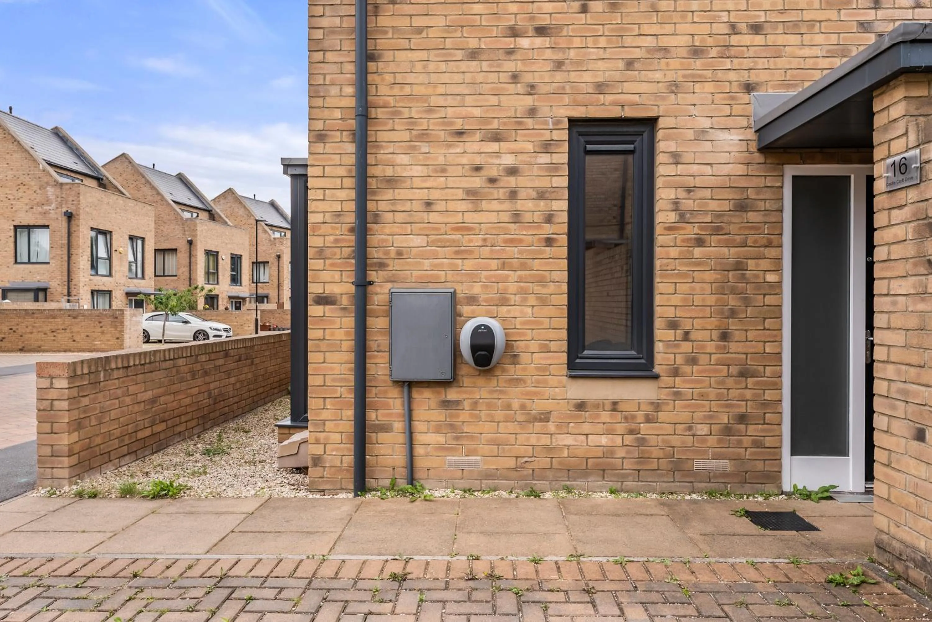 Property building in Sleek and Stylish 2 Bed with Garden and Parking