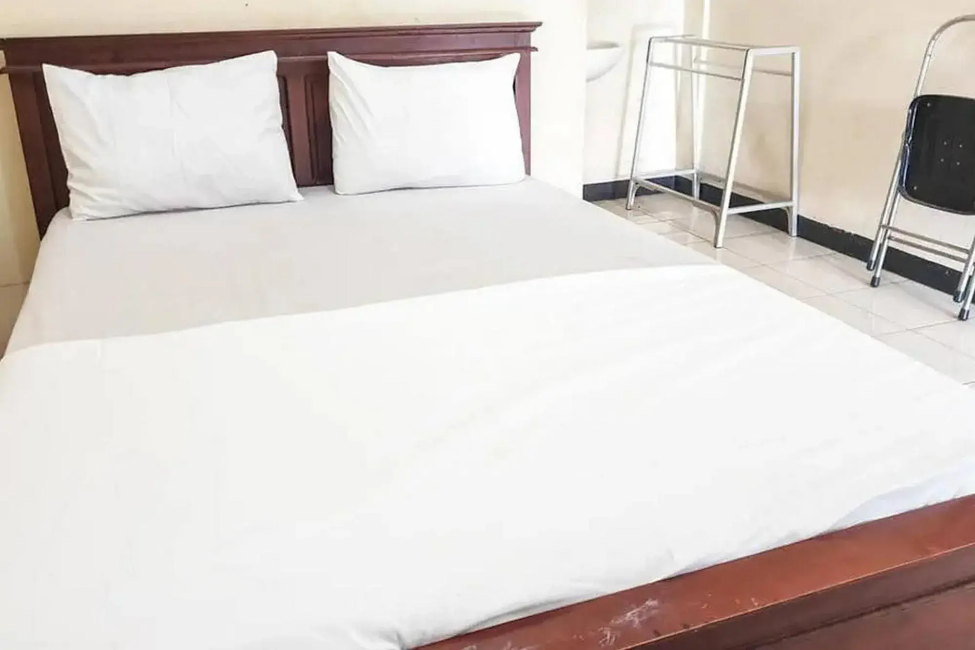 Bed in Penginapan Sinar Harapan near GOR Mastrip Probolinggo Bed in Penginapan Sinar Harapan near GOR Mastrip Probolinggo