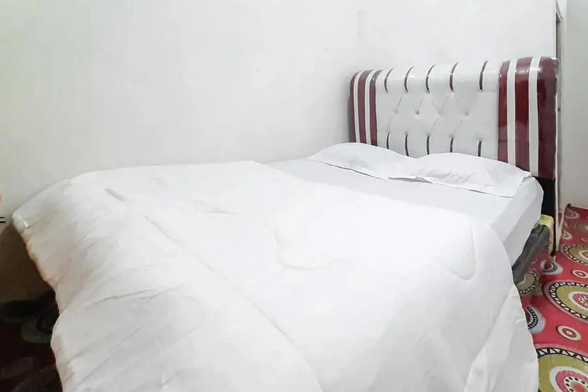 Bed in Homestay Cantika Koto Tengah RedPartner