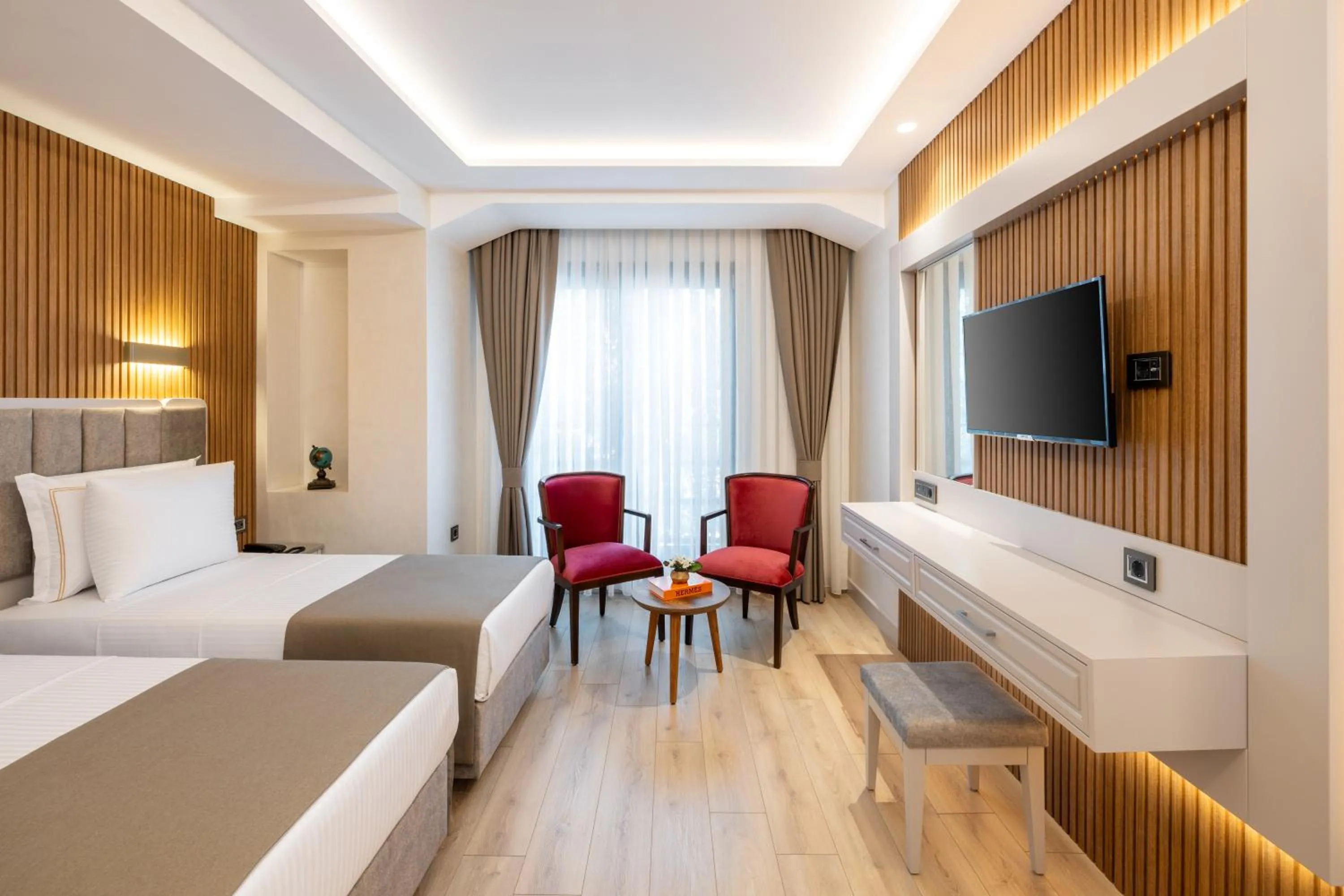 Bed in Carina Gold Hotel And Restaurant