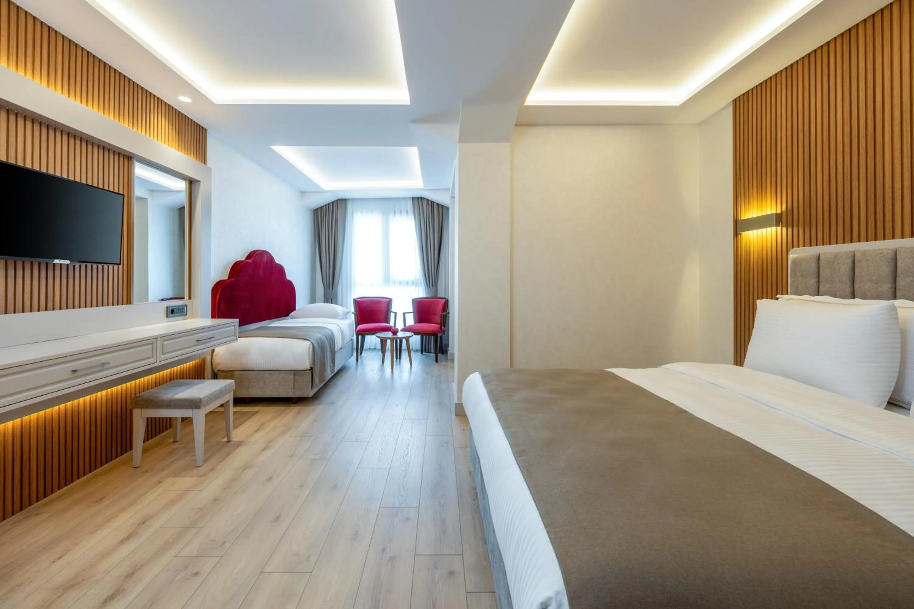 Bed in Carina Gold Hotel And Restaurant