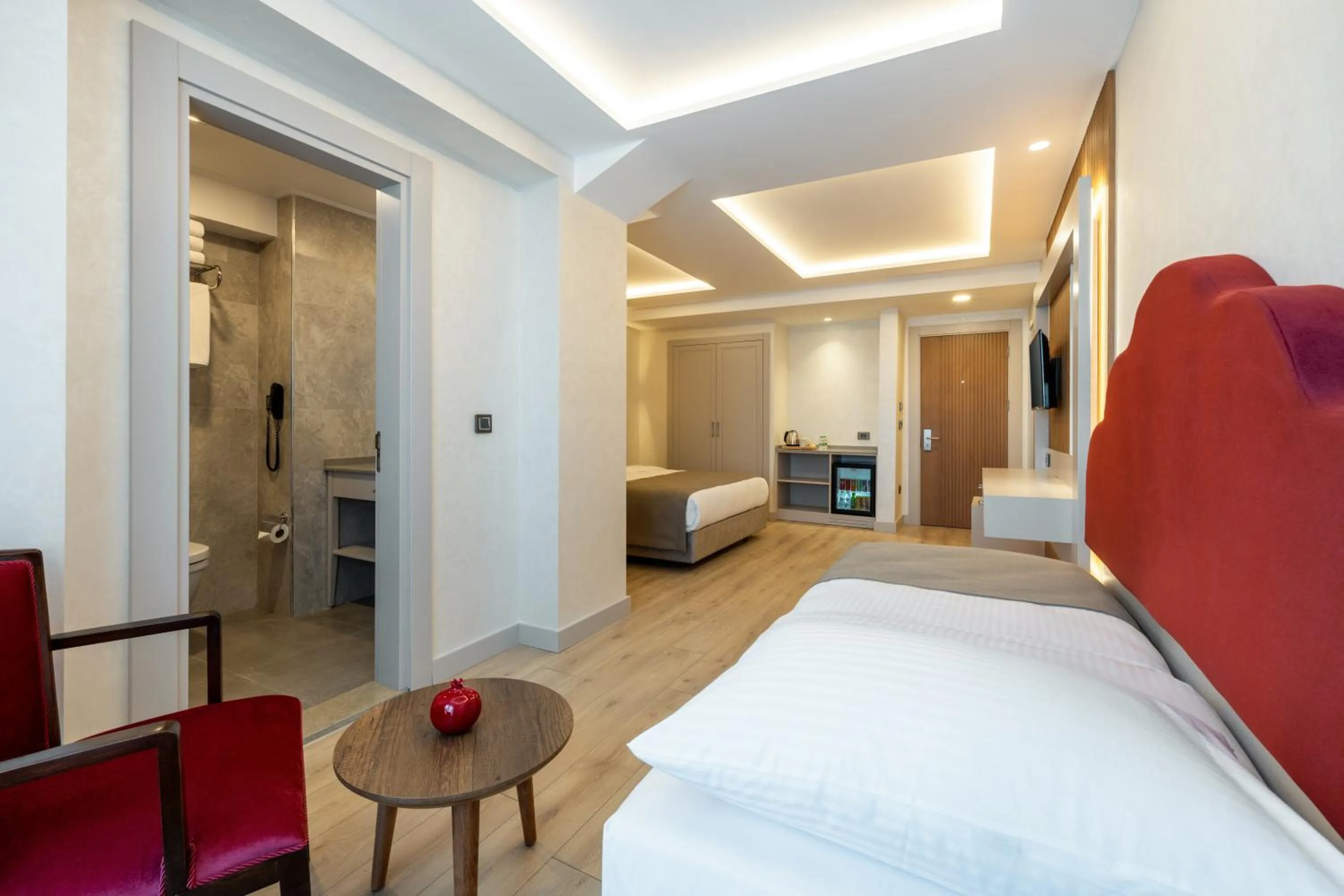 Bed in Carina Gold Hotel And Restaurant