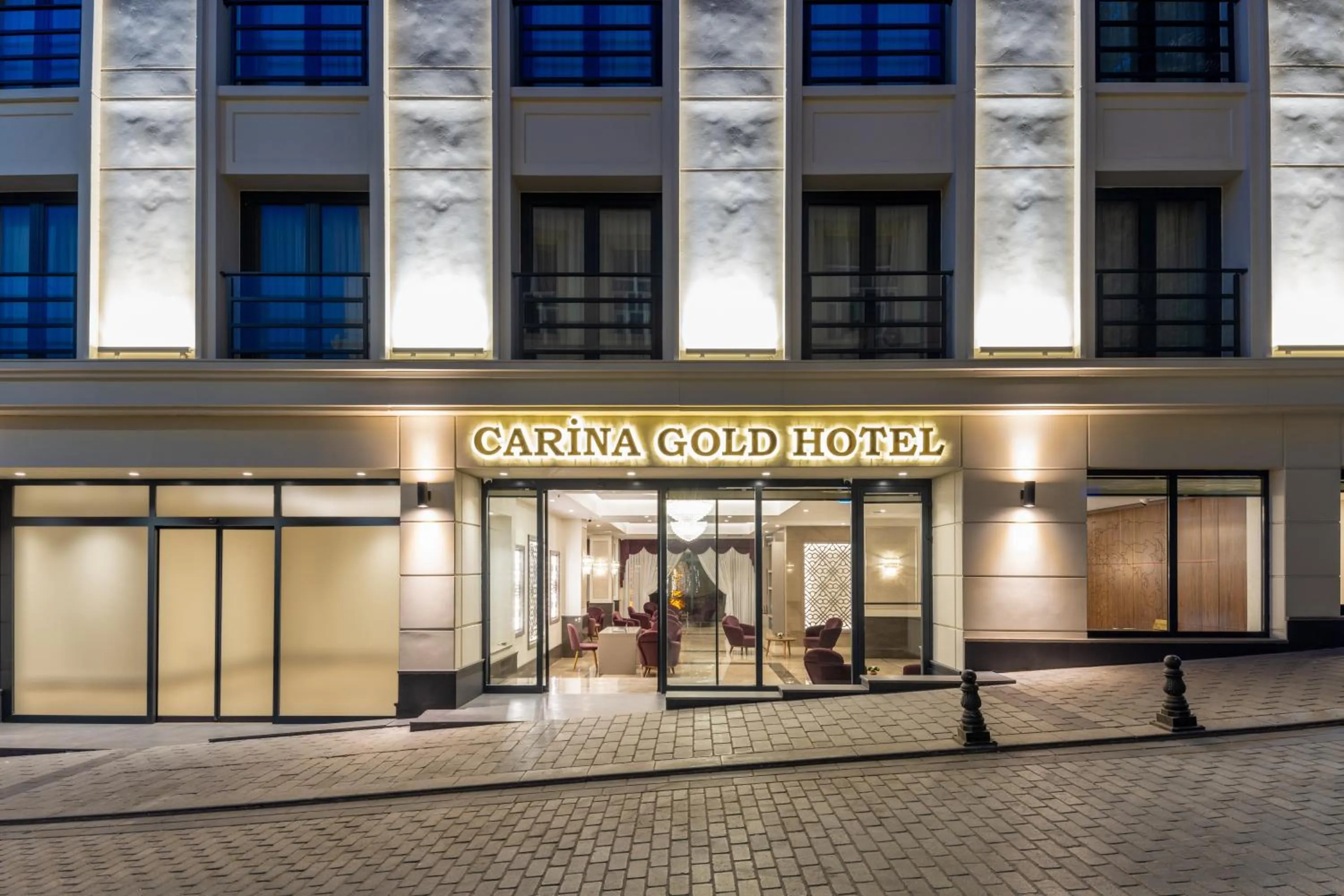 Property building in Carina Gold Hotel And Restaurant