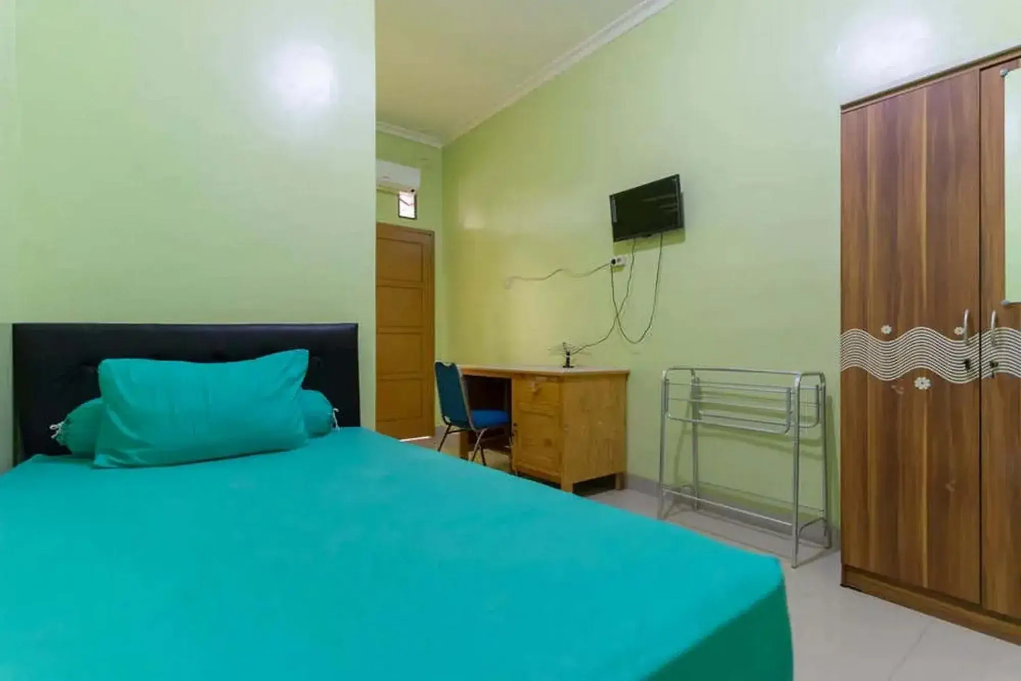 Bed in Kostawira Syariah Bintaro Mitra RedDoorz Bed in Kostawira Syariah Bintaro Mitra RedDoorz