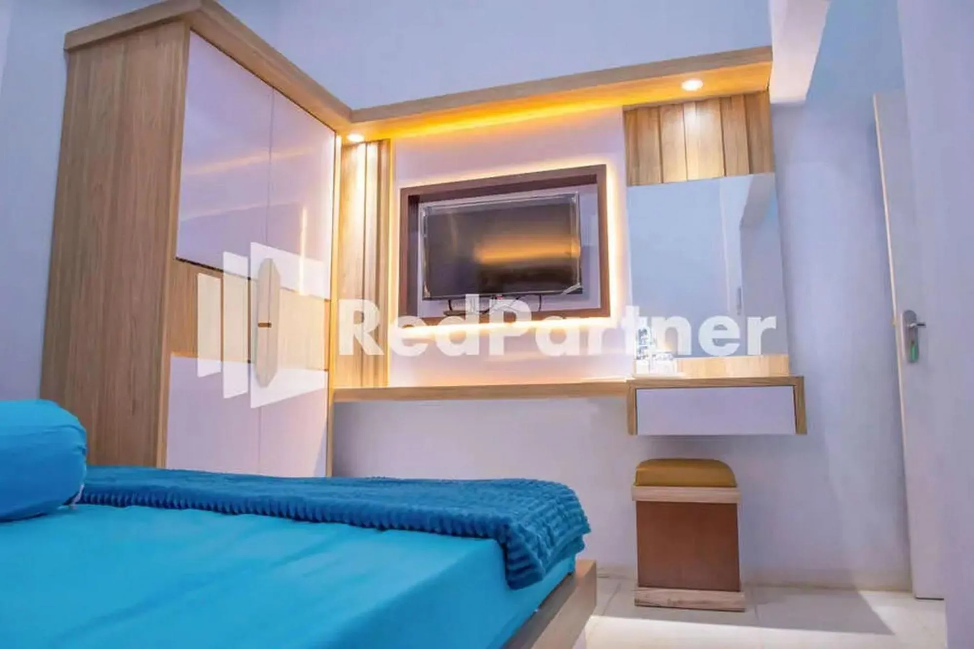 Bed in Hotel Rai's Palopo Exclusive Mitra RedDoorz