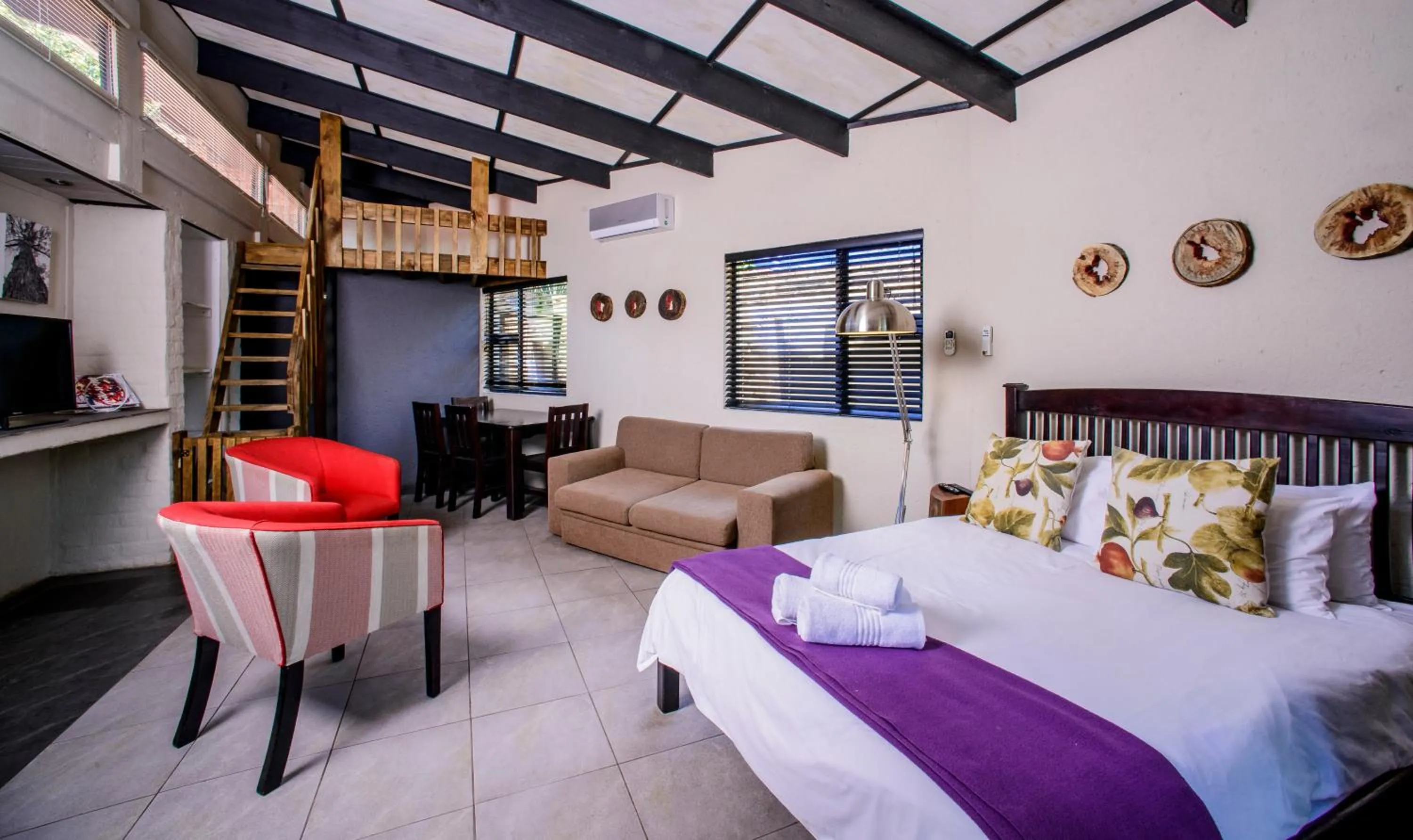 Bed in Zebrina Guest House