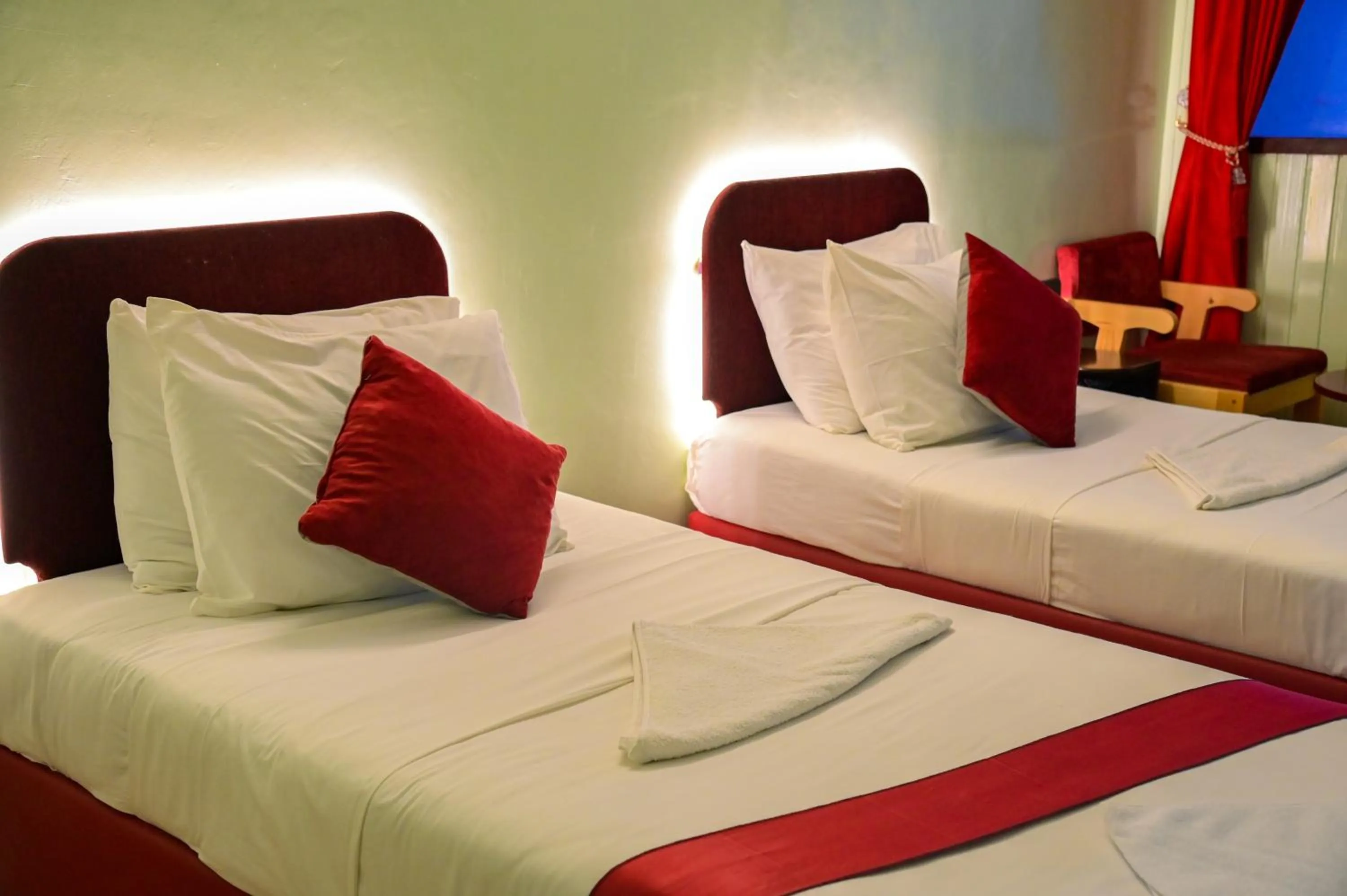 Bed in SIESTA HOTEL