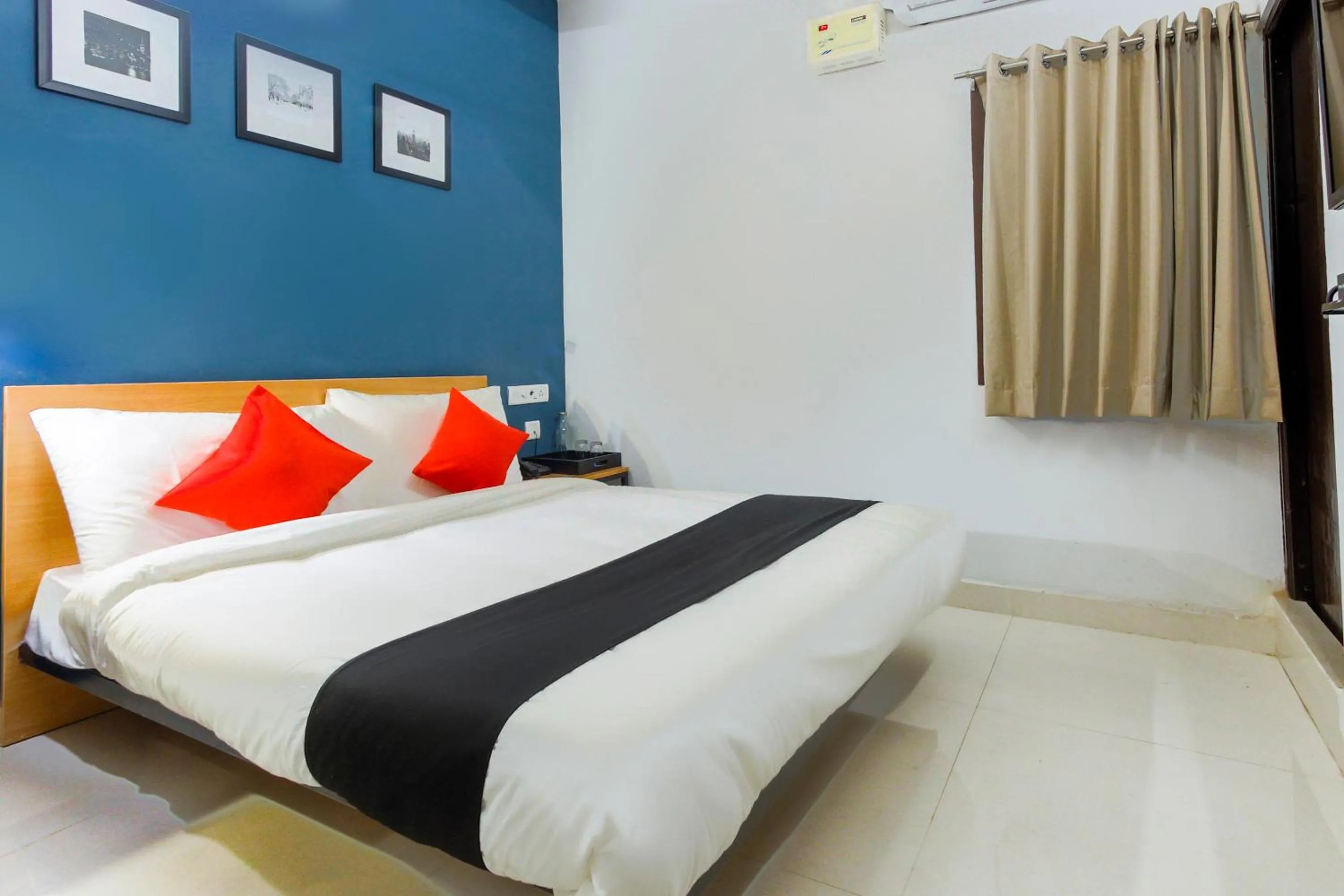 Bedroom in Hotel O Murugan Rooms