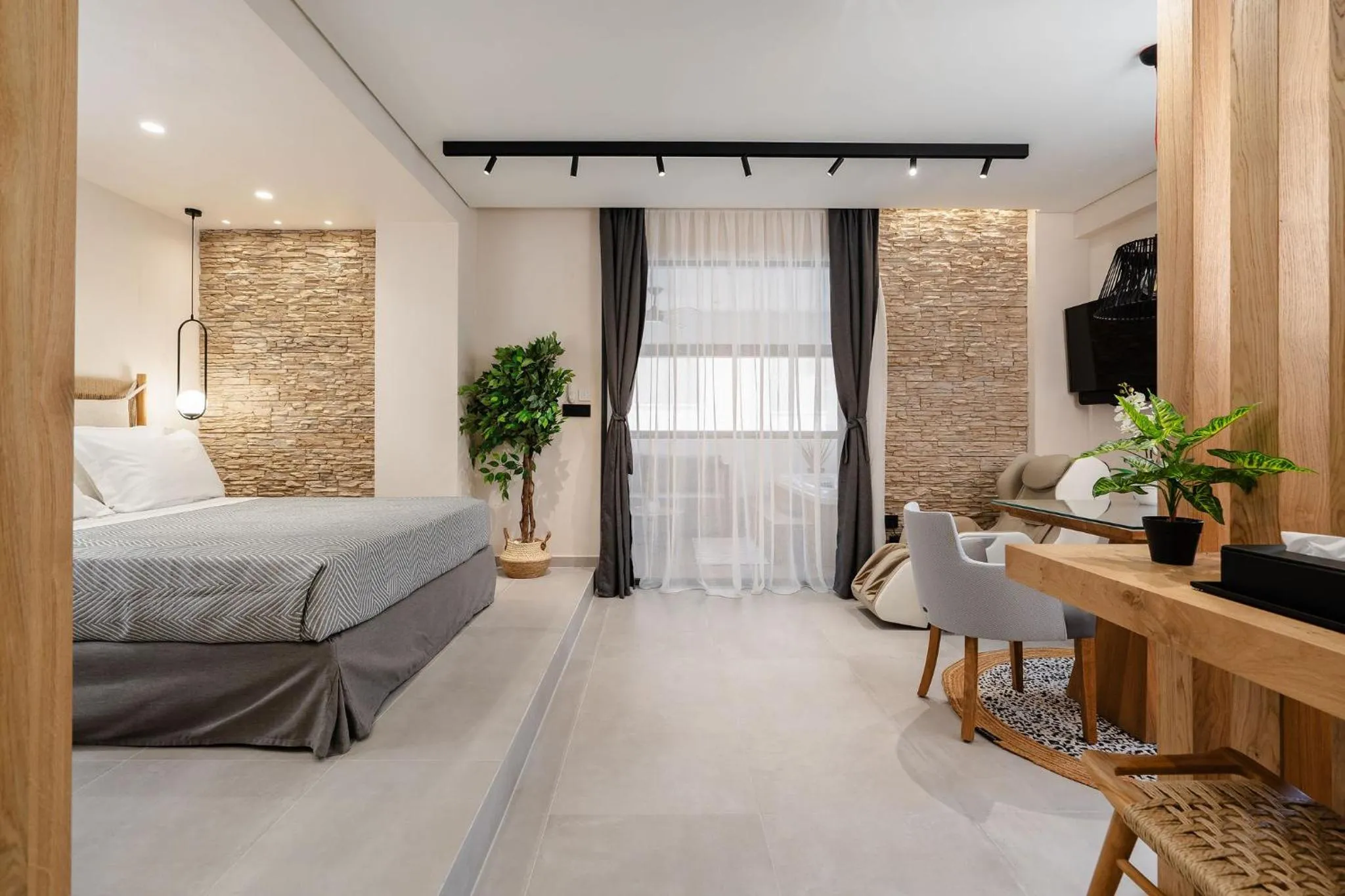 Bed in Legato Spa Suites