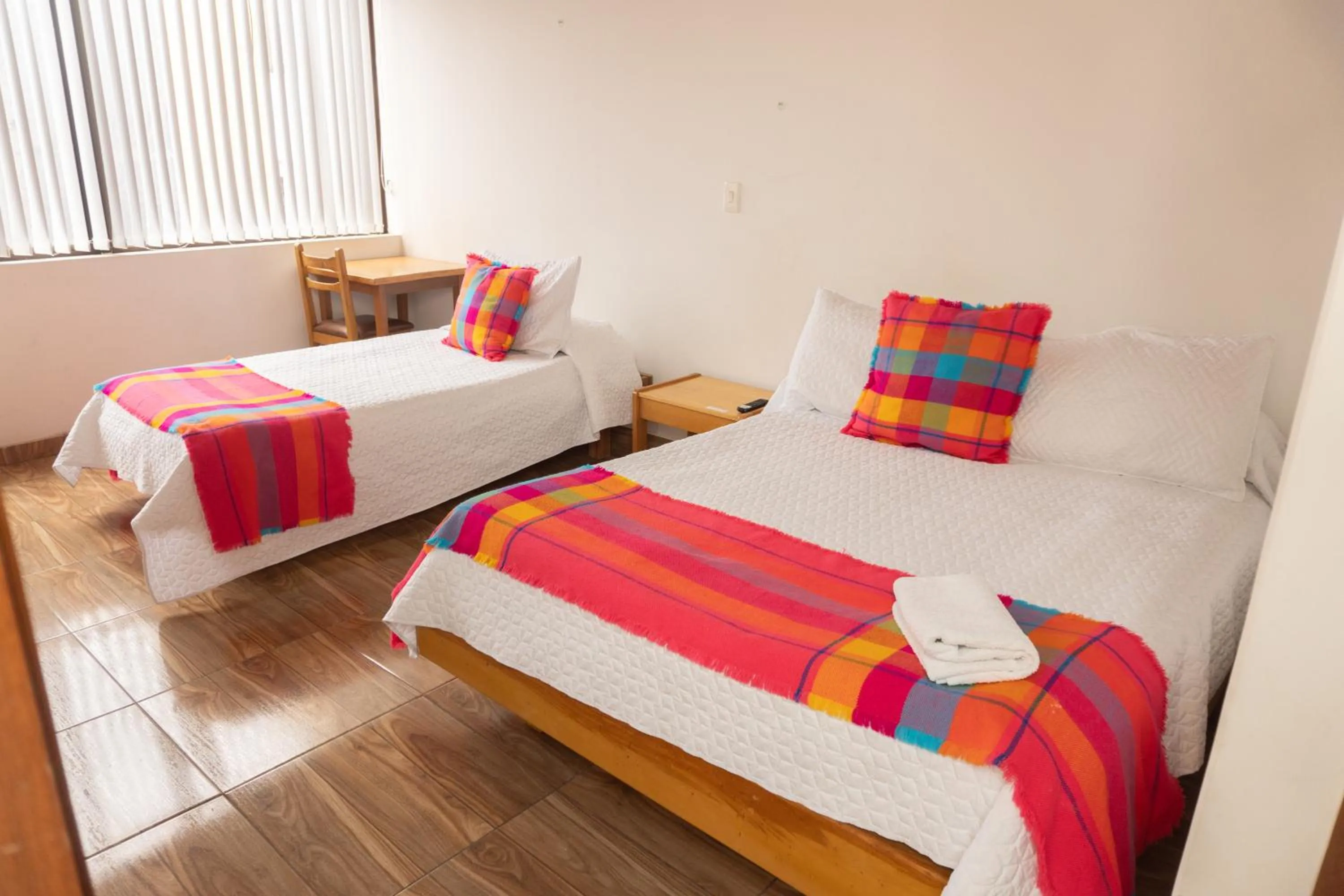 Bed in HOTEL SUAREL CENTER