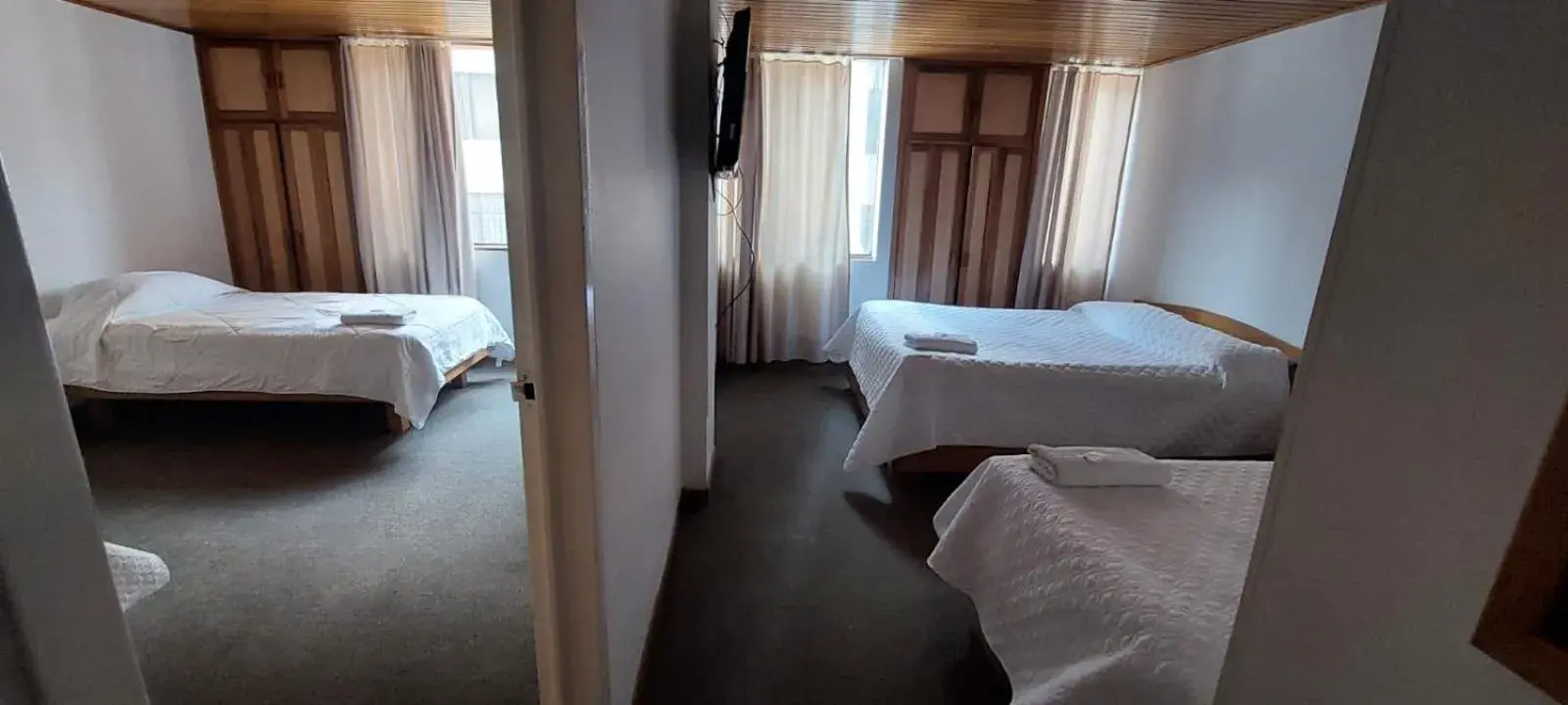 Quadruple Room in HOTEL SUAREL CENTER Quadruple Room in HOTEL SUAREL CENTER