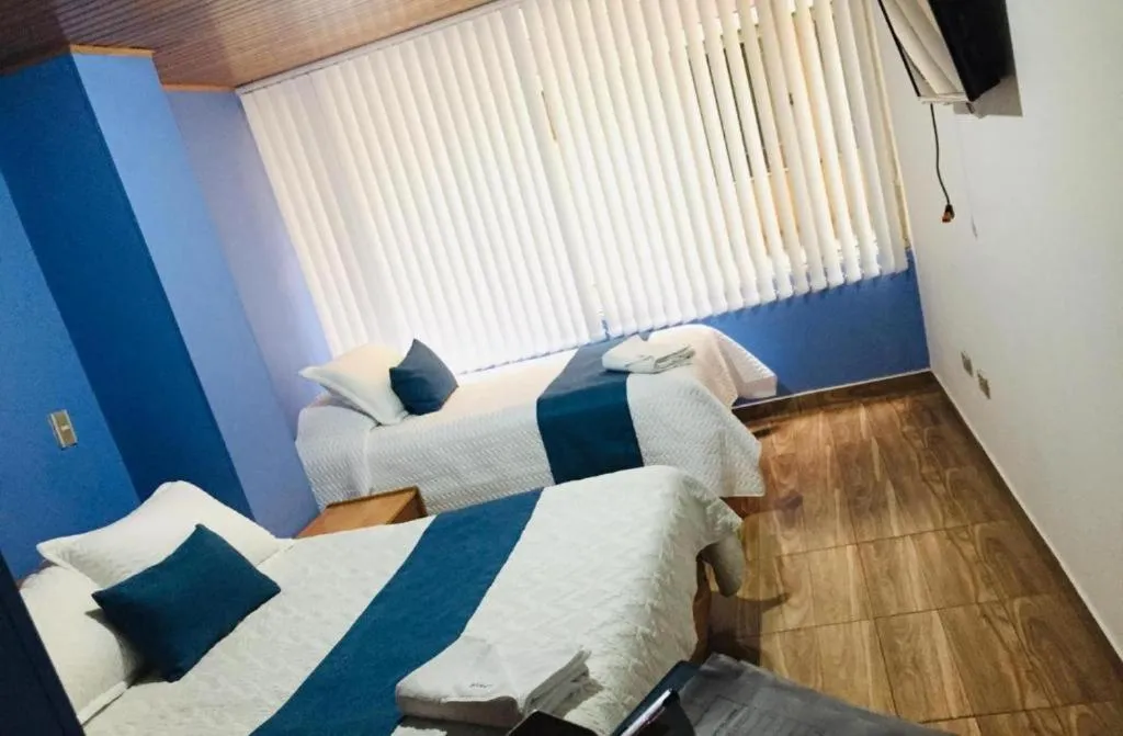 Bed in HOTEL SUAREL CENTER