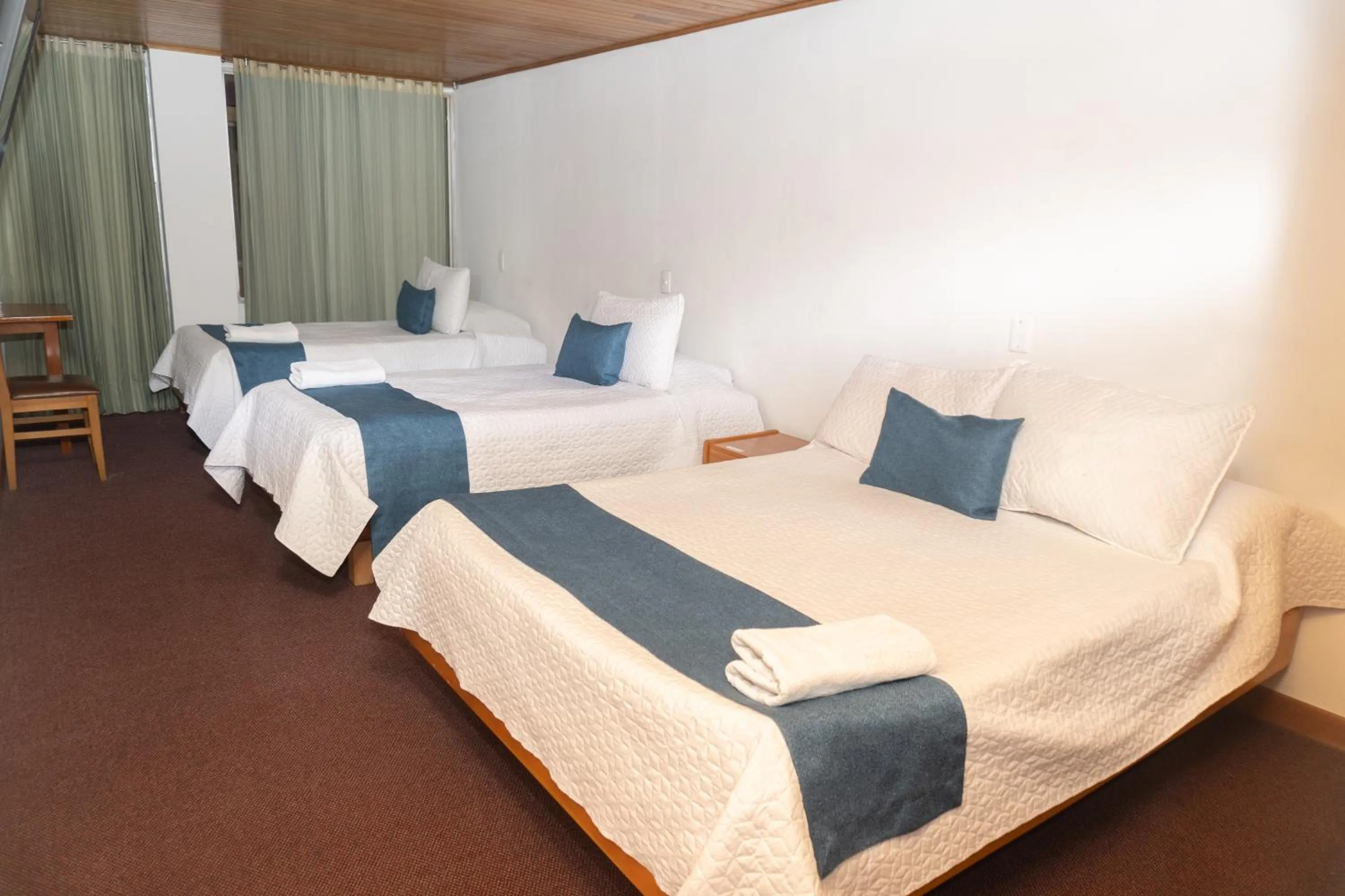 Bed in HOTEL SUAREL CENTER