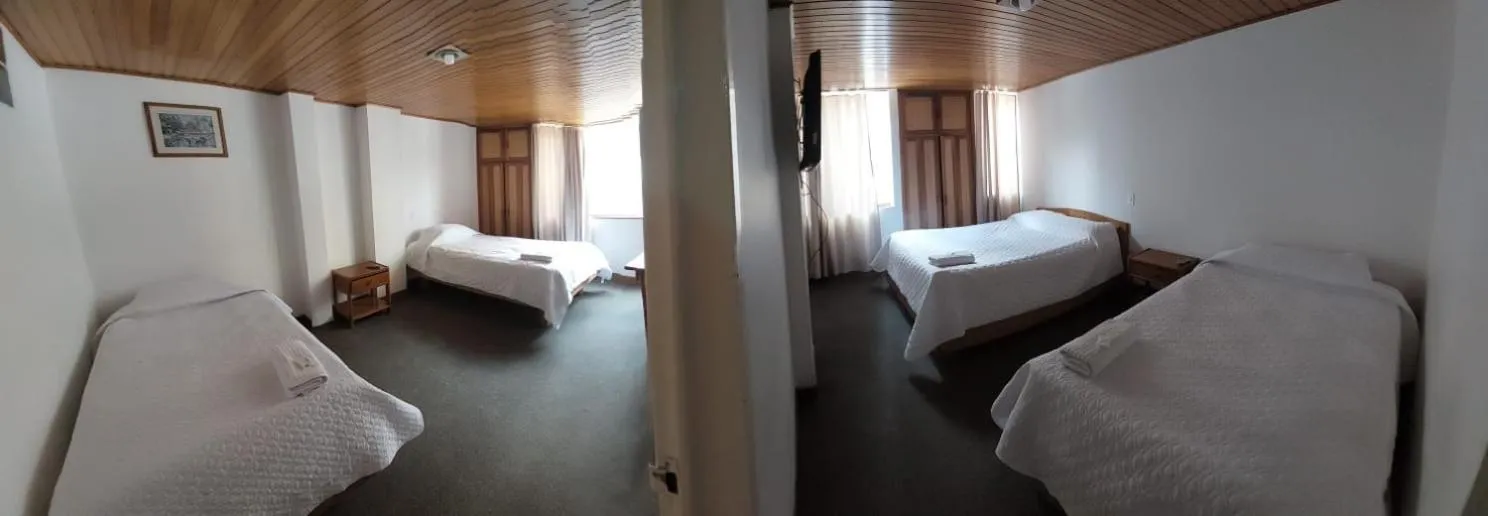 Bed in HOTEL SUAREL CENTER