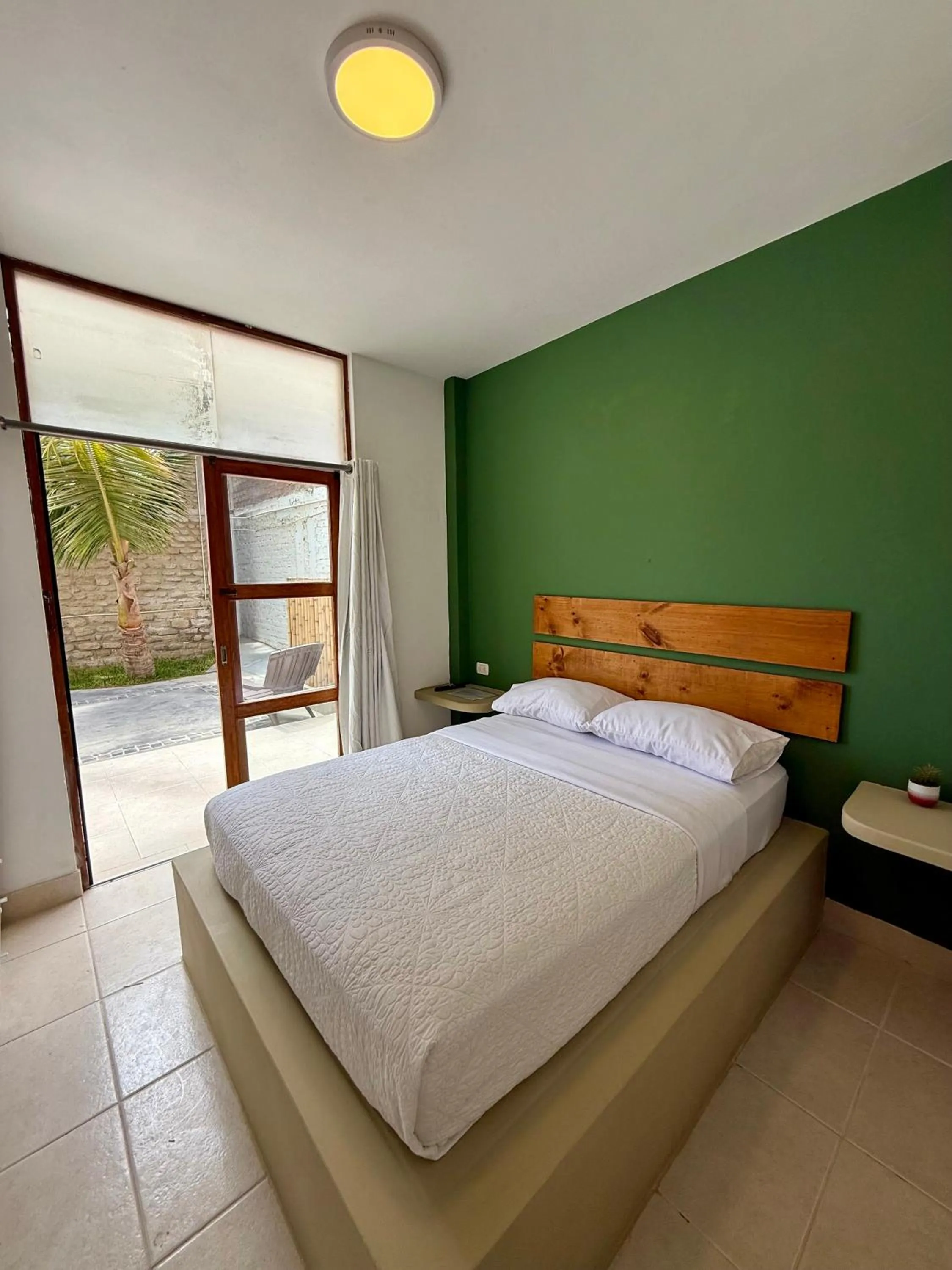 Bed in Hotel Puerto Antiguo