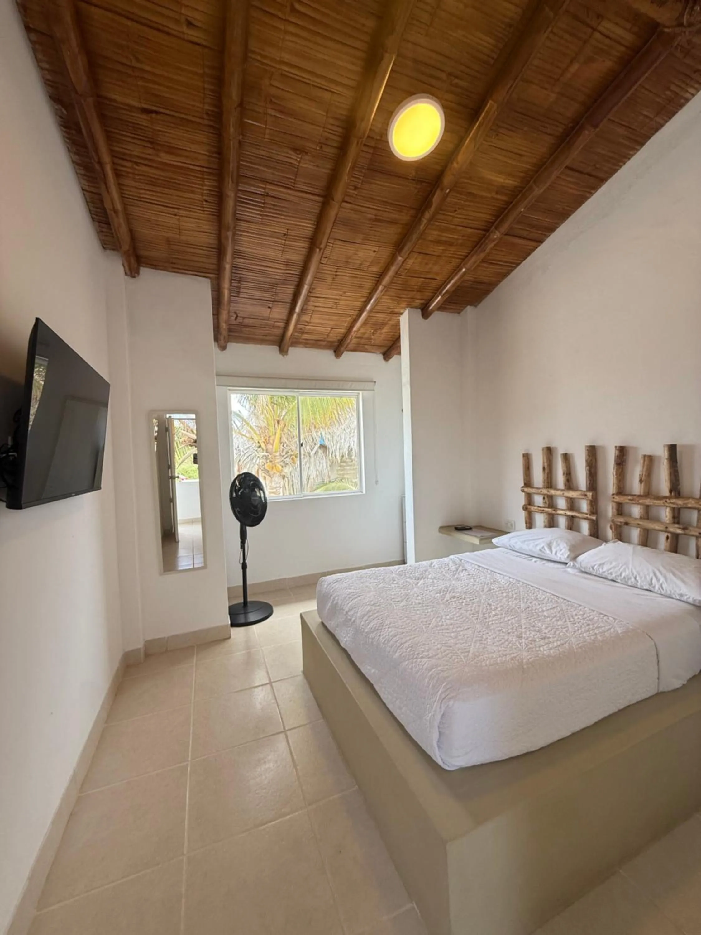 Bed in Hotel Puerto Antiguo