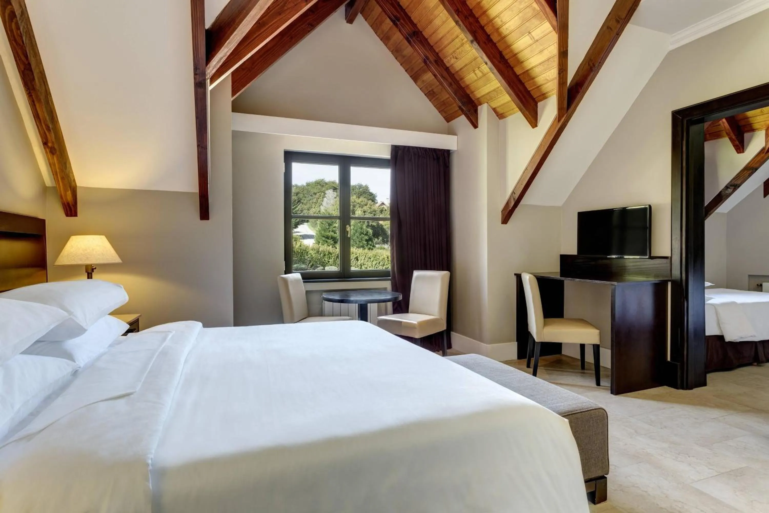 Bedroom, Bed in Arelauquen Lodge, a Tribute Portfolio Hotel