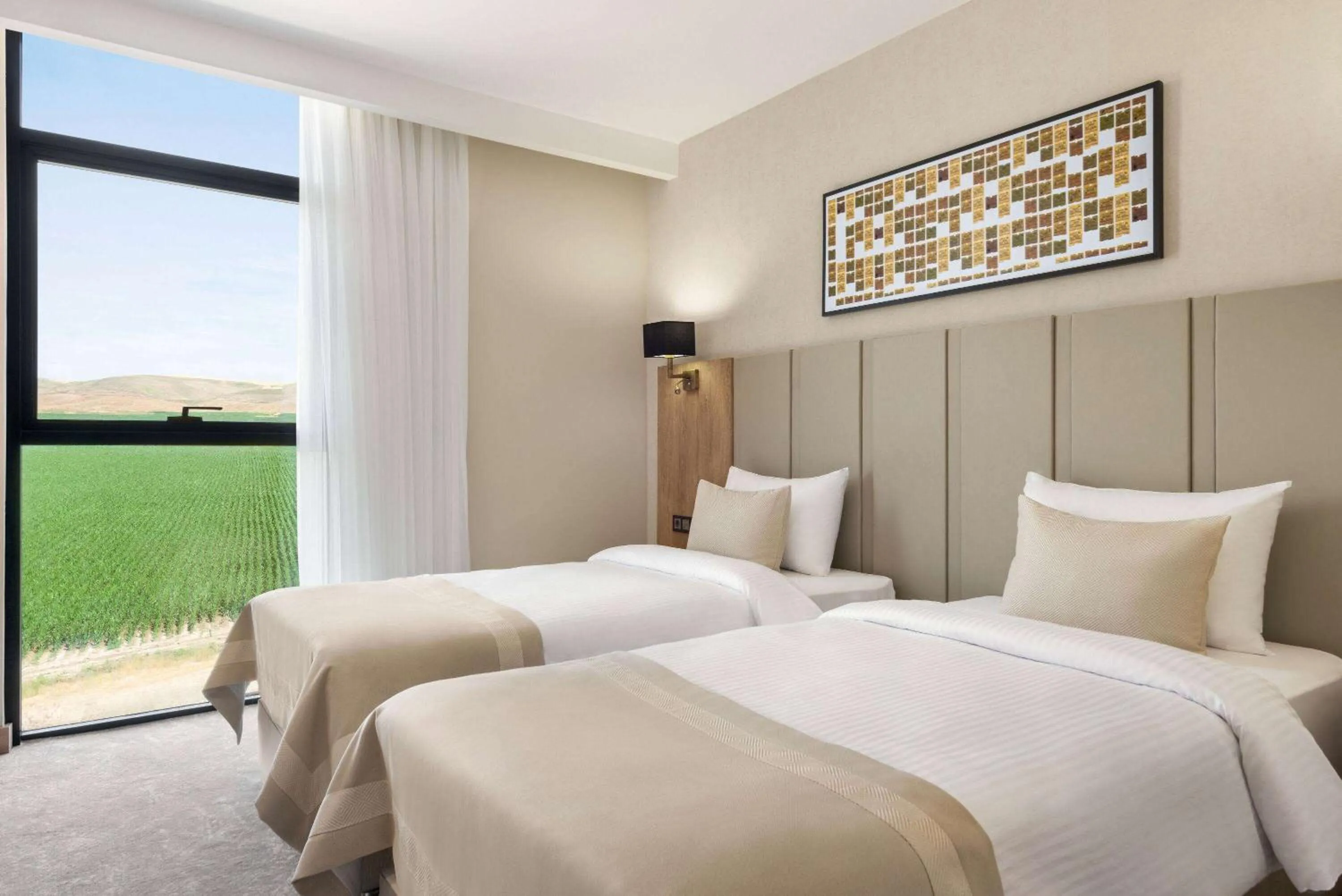 Photo of the whole room, Bed in Ramada Plaza By Wyndham Batman