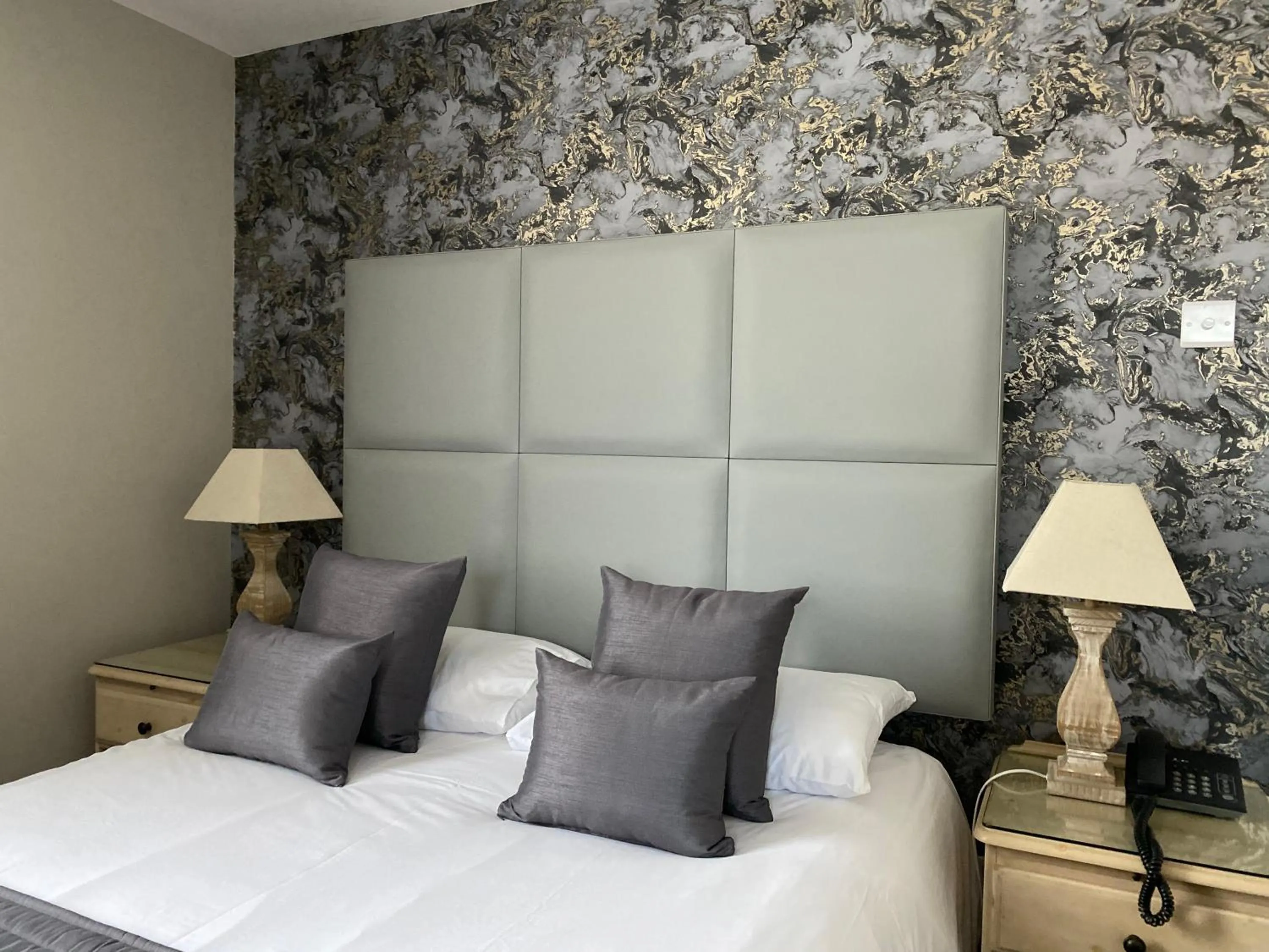 Bed in Camelia Hotel