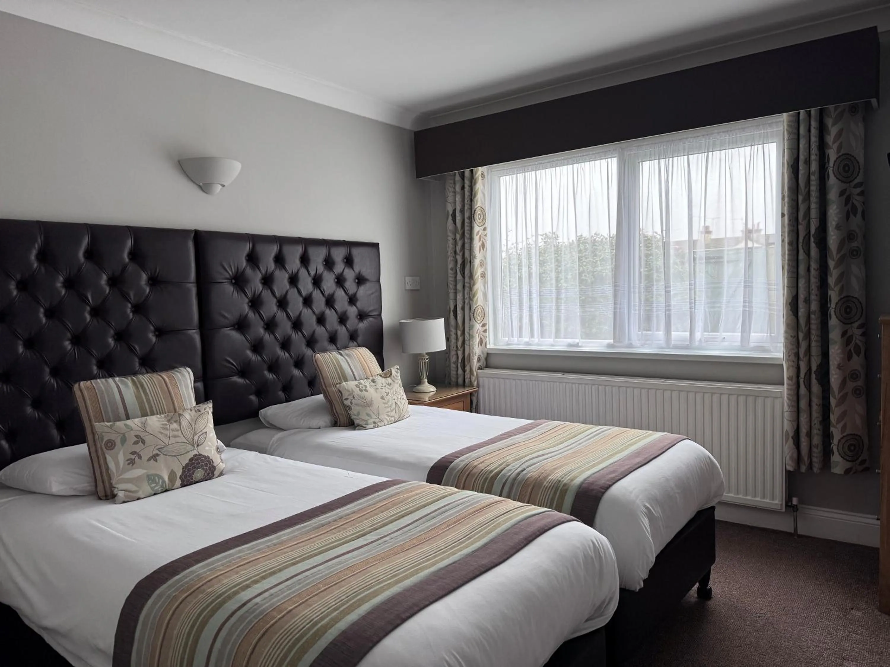 Bed in Camelia Hotel