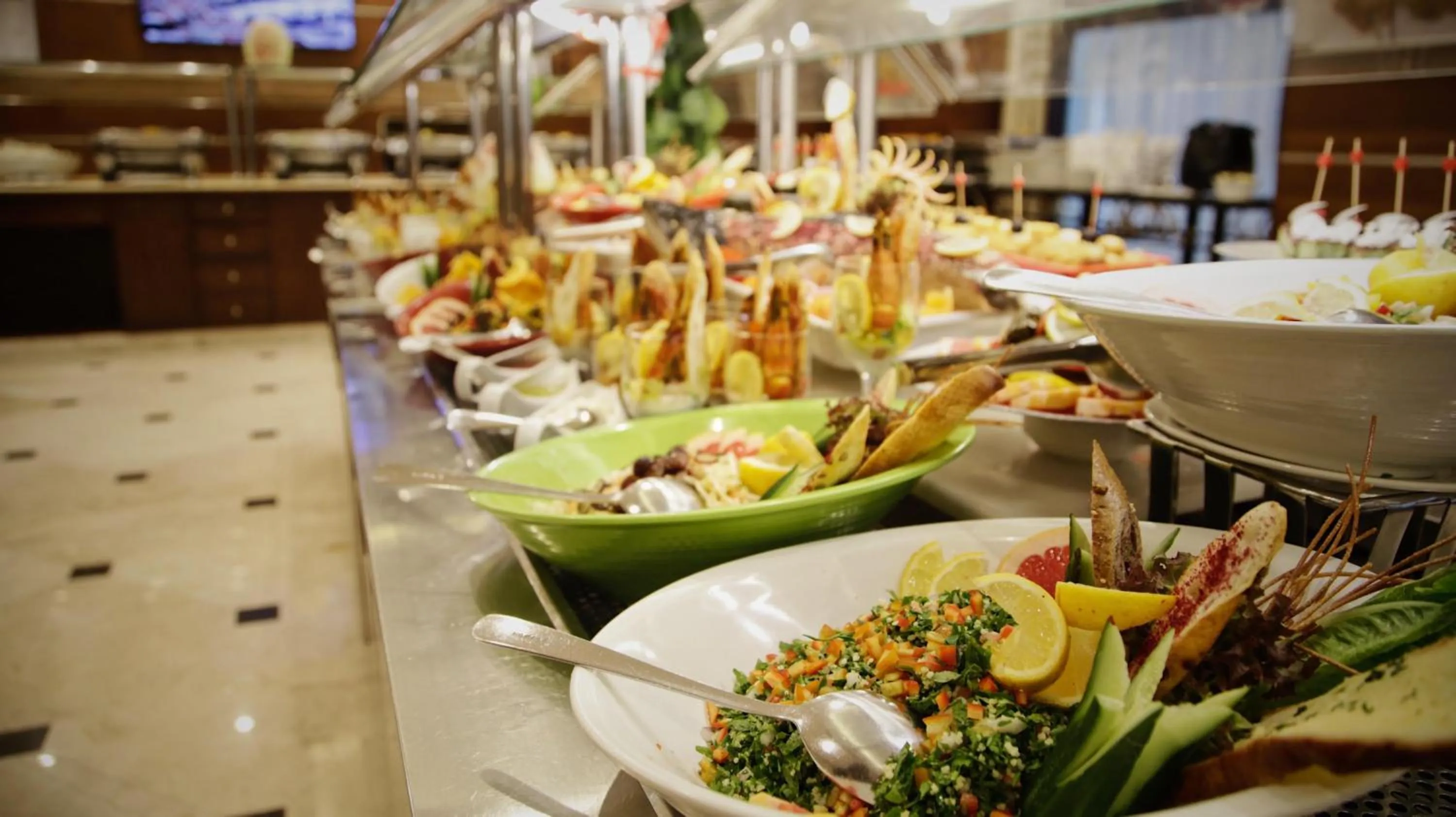 Food and drinks in فندق نزل رويال Nozol Royal Hotel