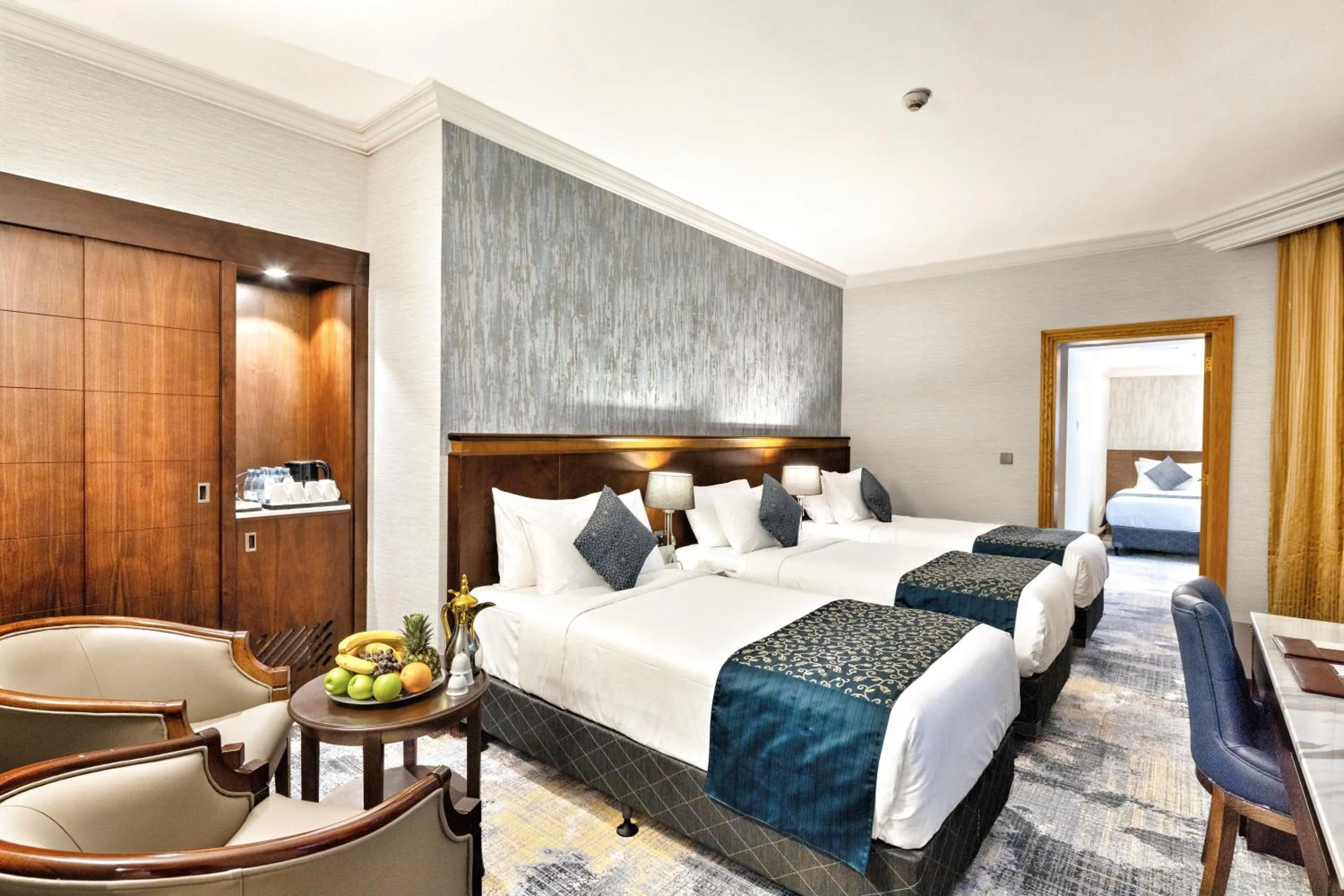 Bed in فندق نزل رويال Nozol Royal Hotel