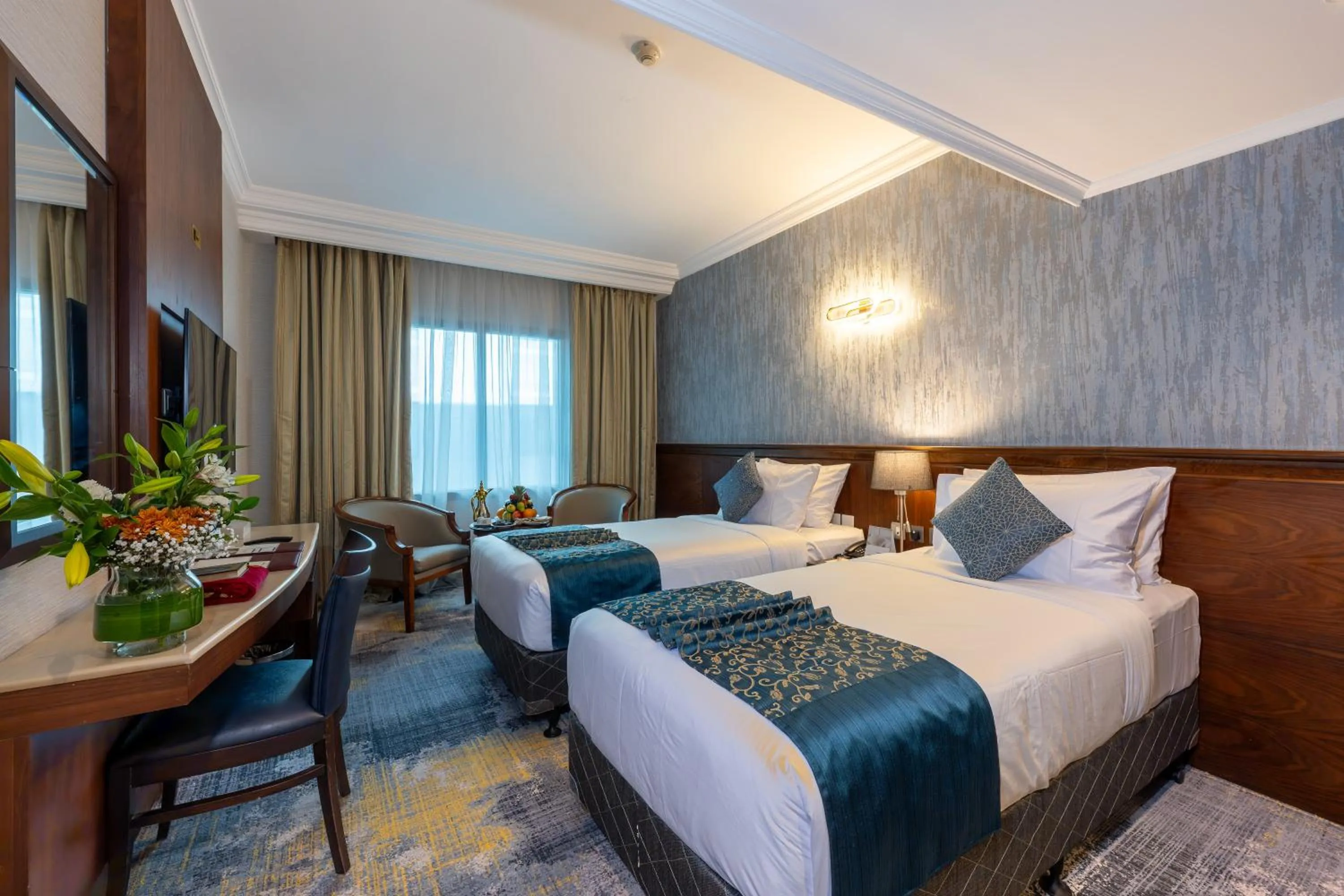 Bed in فندق نزل رويال Nozol Royal Hotel