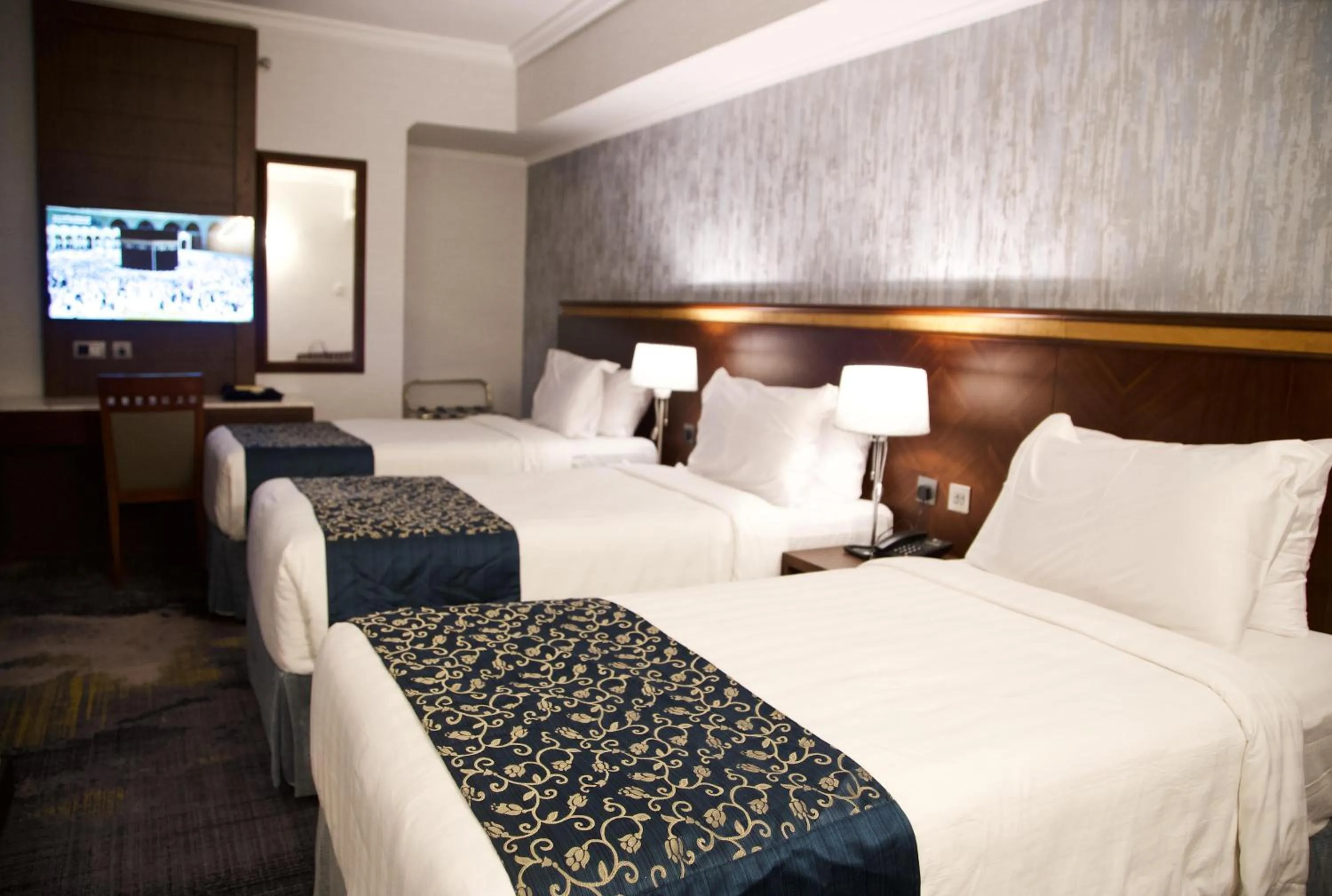 Bed in فندق نزل رويال Nozol Royal Hotel