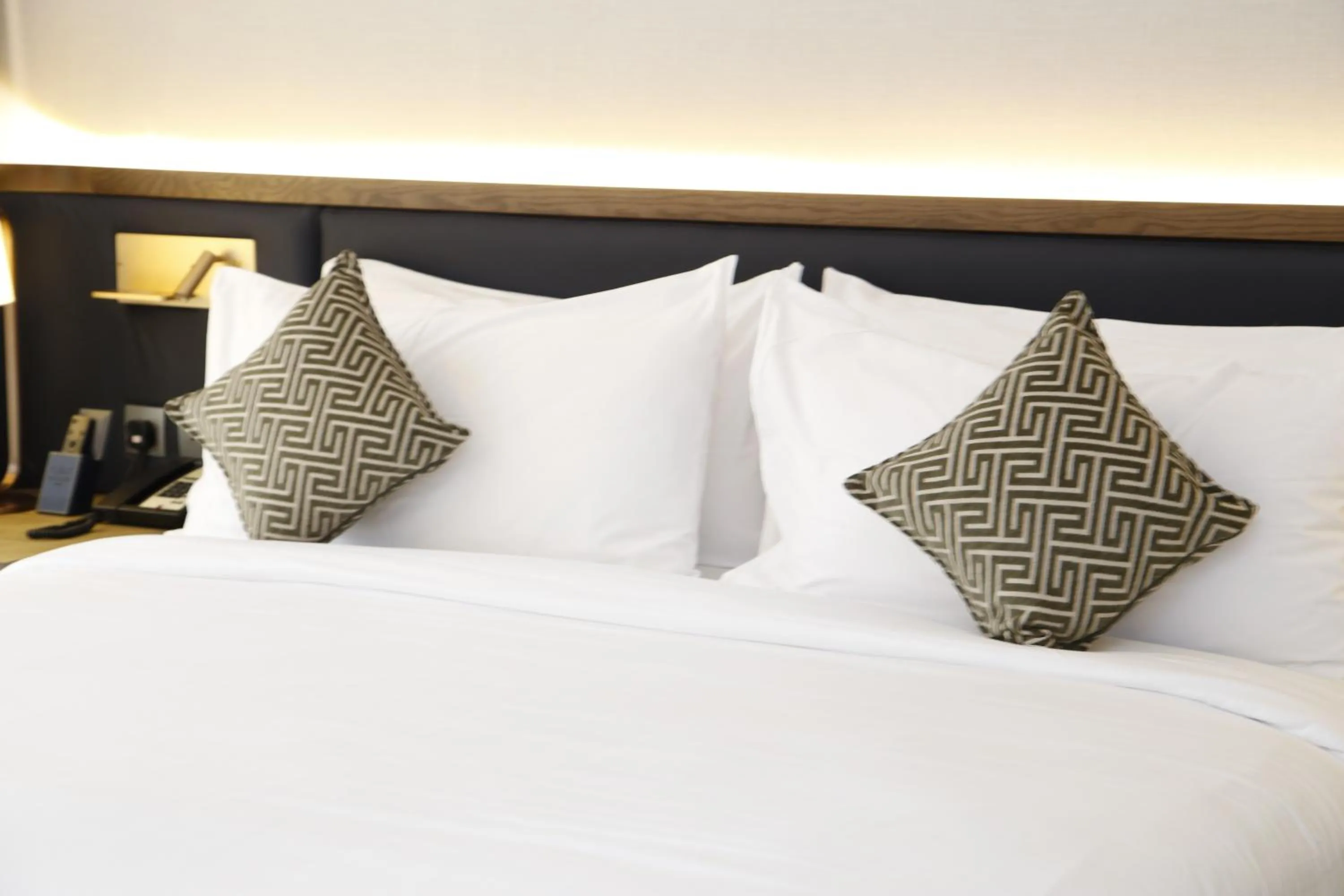 Bed in فندق نزل رويال Nozol Royal Hotel