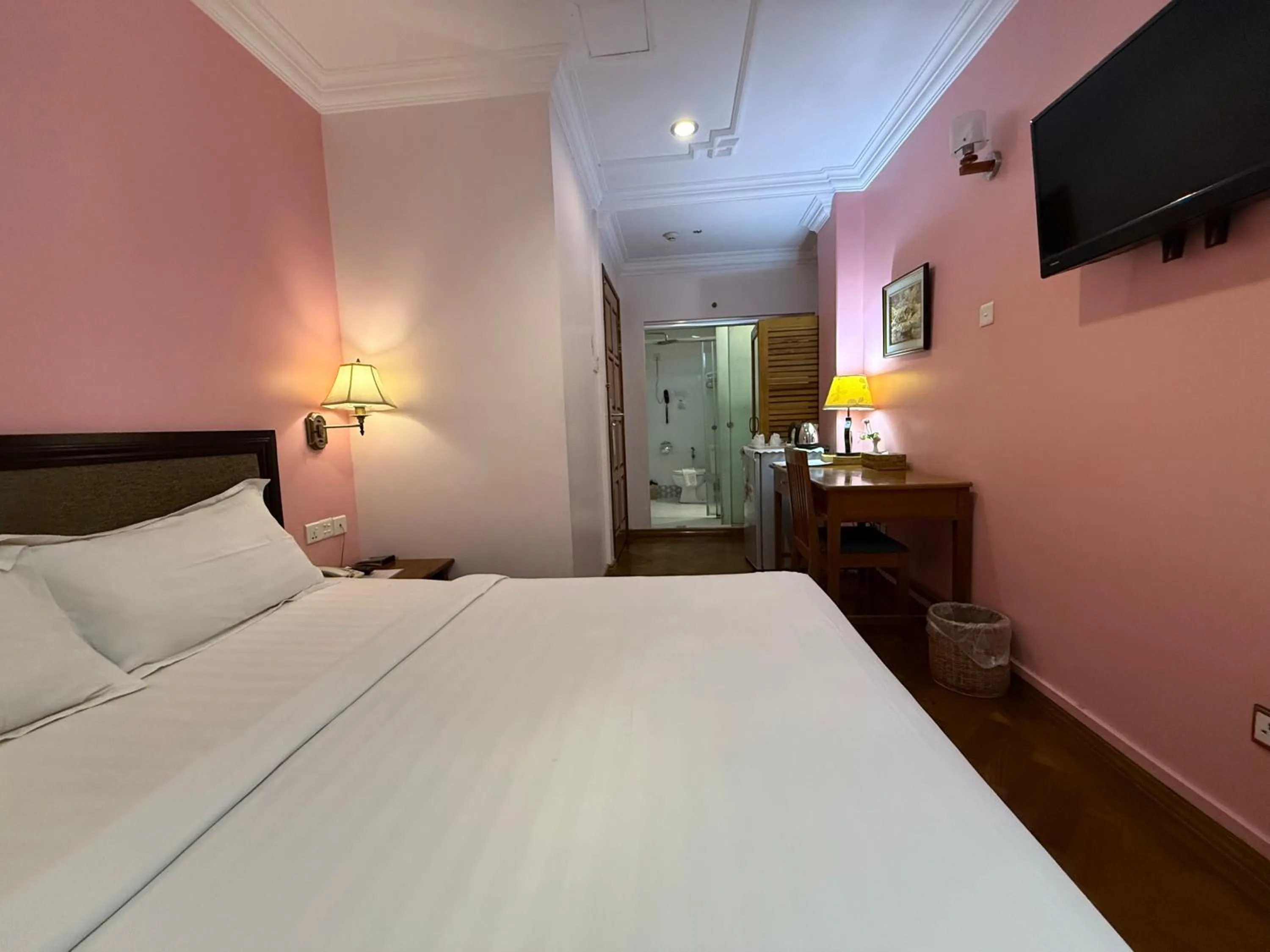 Bed in Grand Laurel Hotel