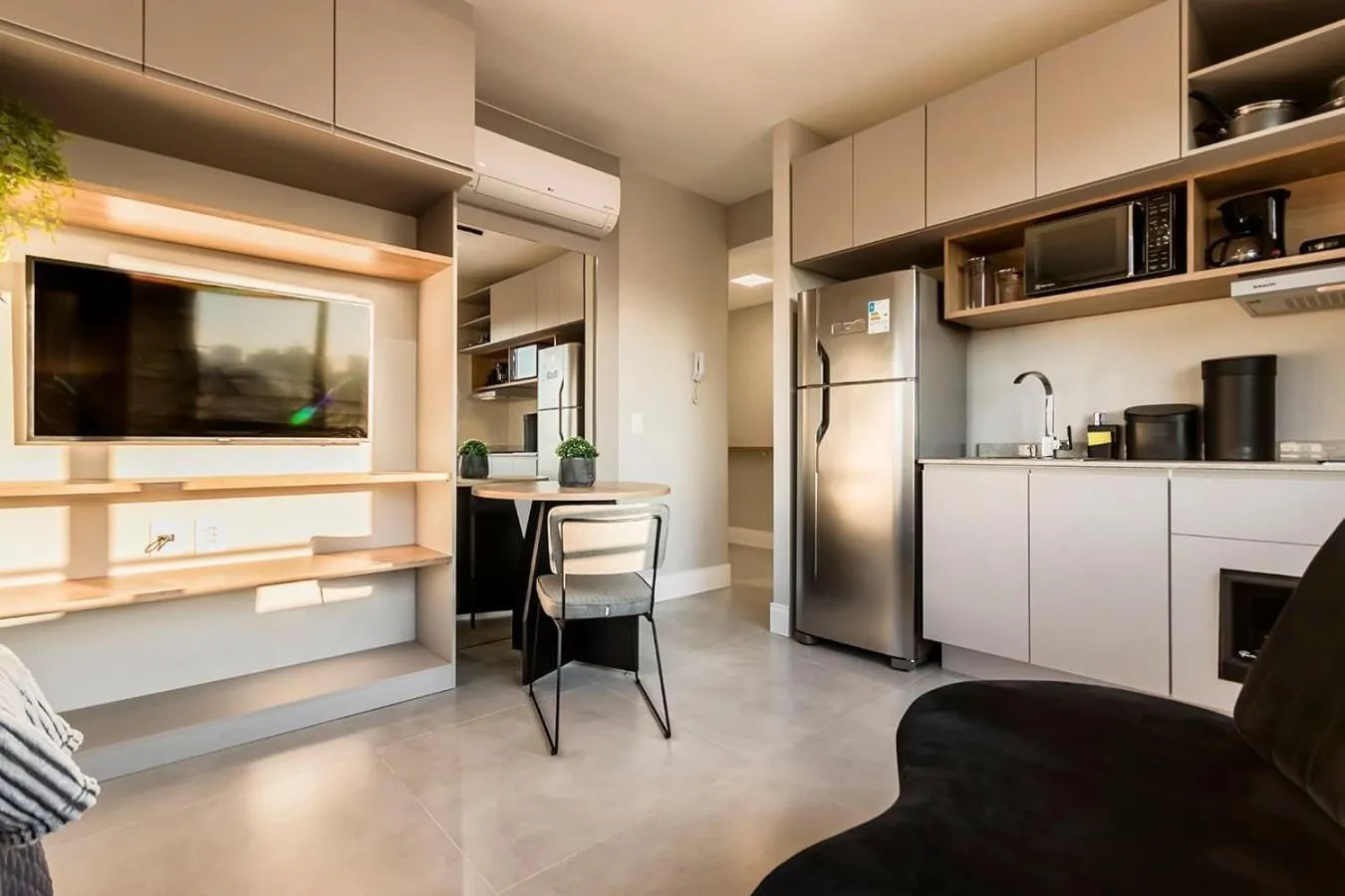 Living room in Lindo studio novo e moderno JRE1401