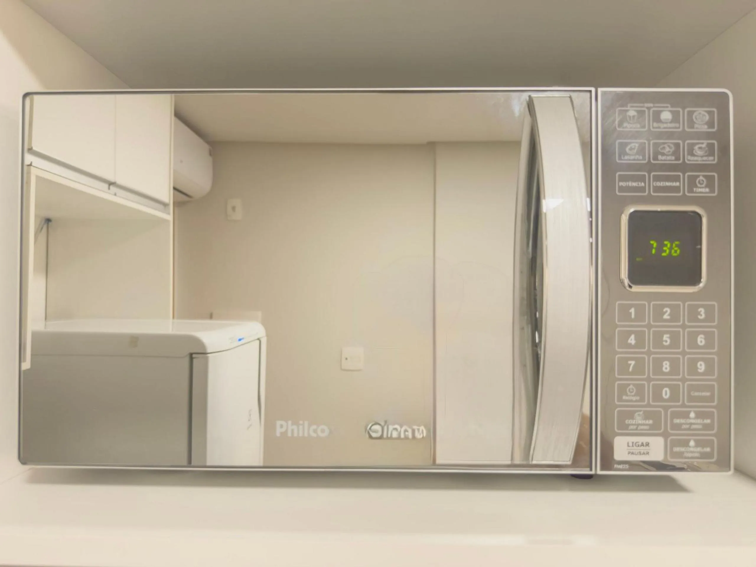 Kitchen or kitchenette in APTOS 1 e 2QTO Lava e Seca e Academia