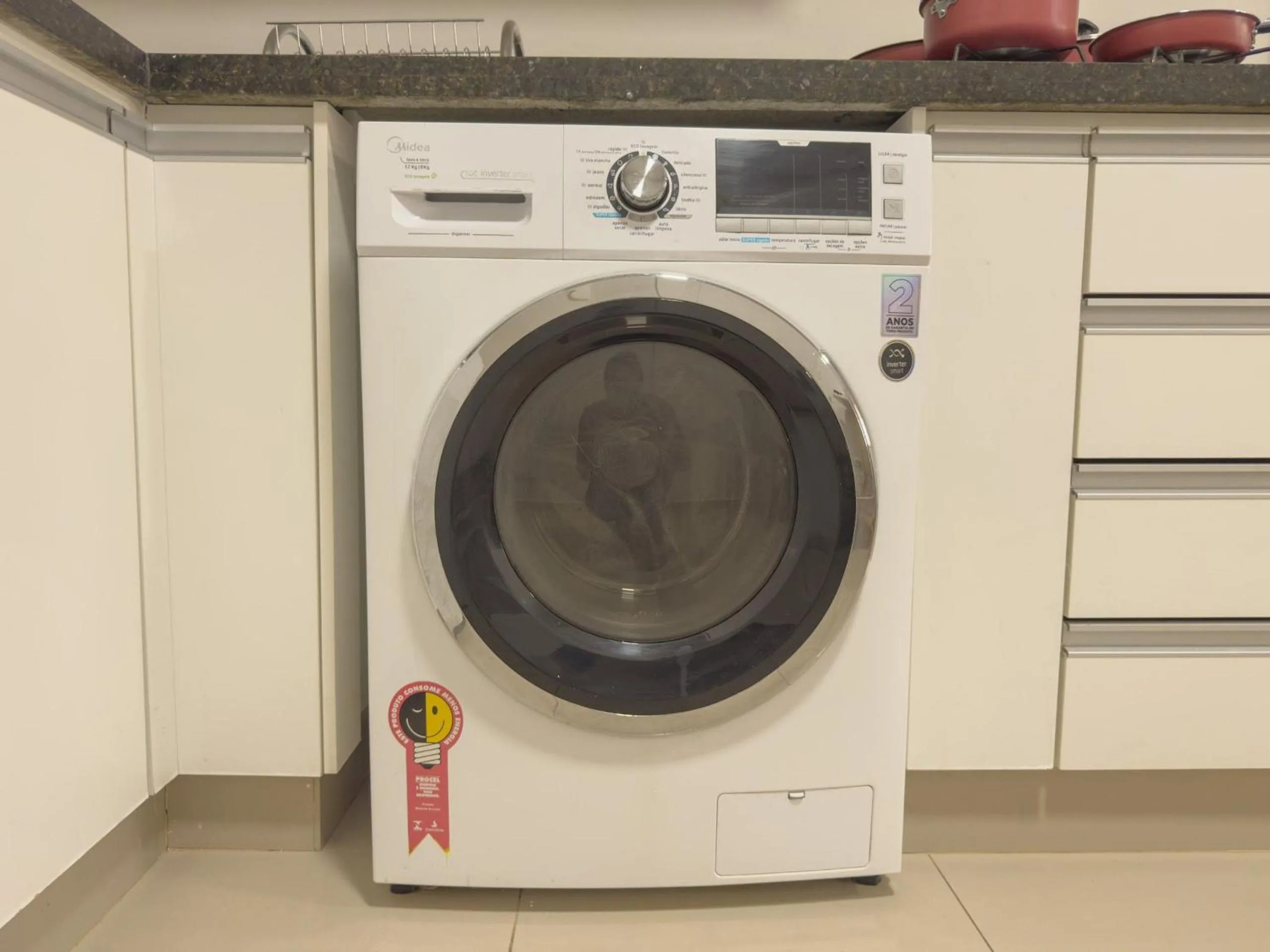 Kitchen or kitchenette in APTOS 1 e 2QTO Lava e Seca e Academia