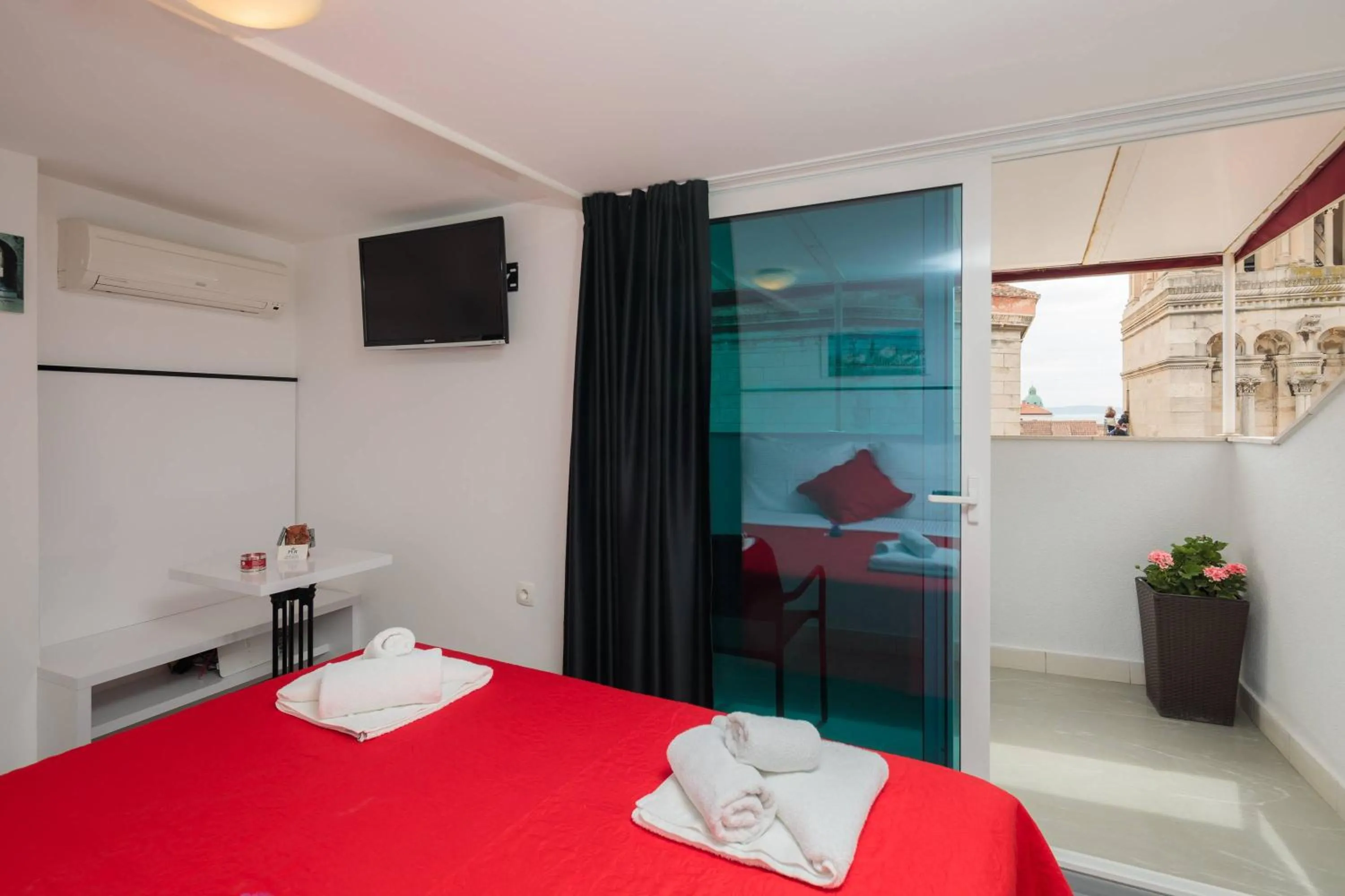 Bed in PLR Luxury Rooms