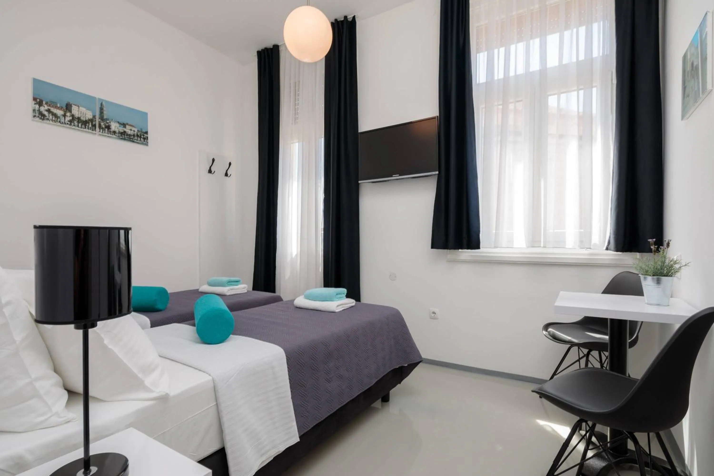 Bed in PLR Luxury Rooms