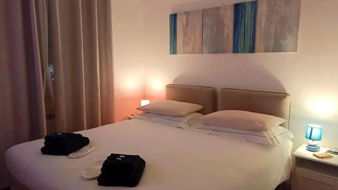 Bed in Rose Antiche Vatican B&B