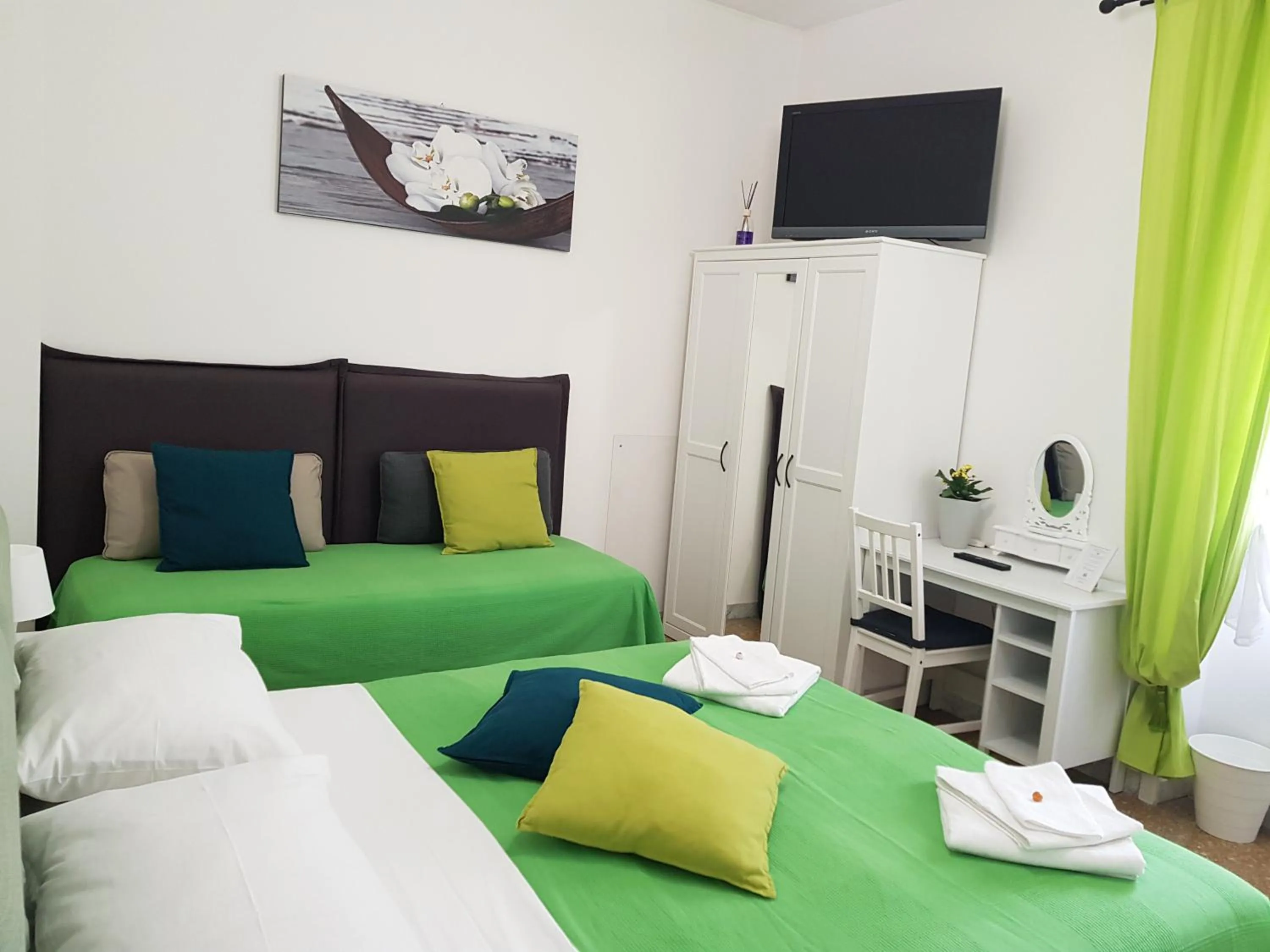 Bed in Rose Antiche Vatican B&B