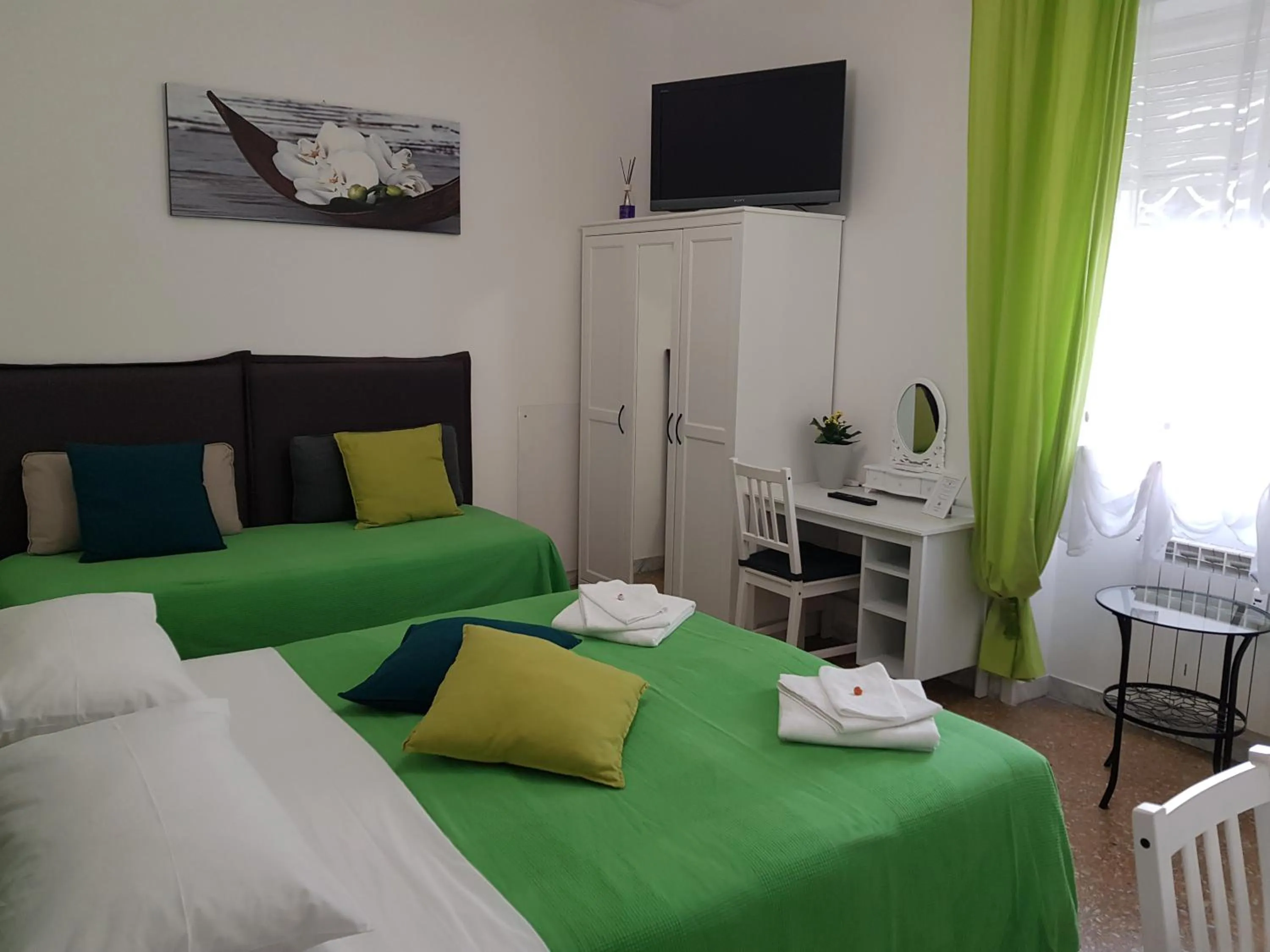 Bed in Rose Antiche Vatican B&B