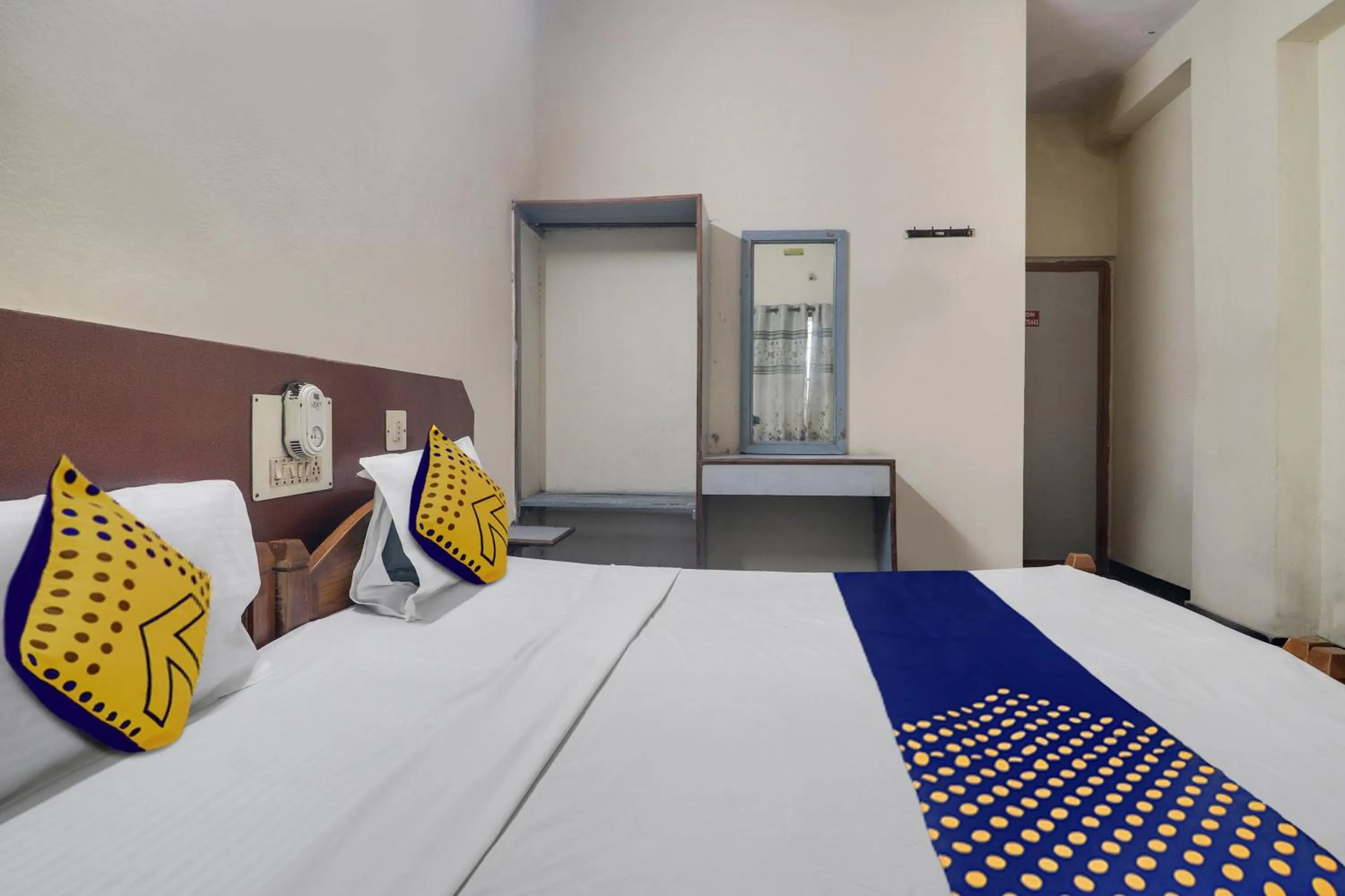 Bedroom, Bed in SPOT ON New Balaji Residency