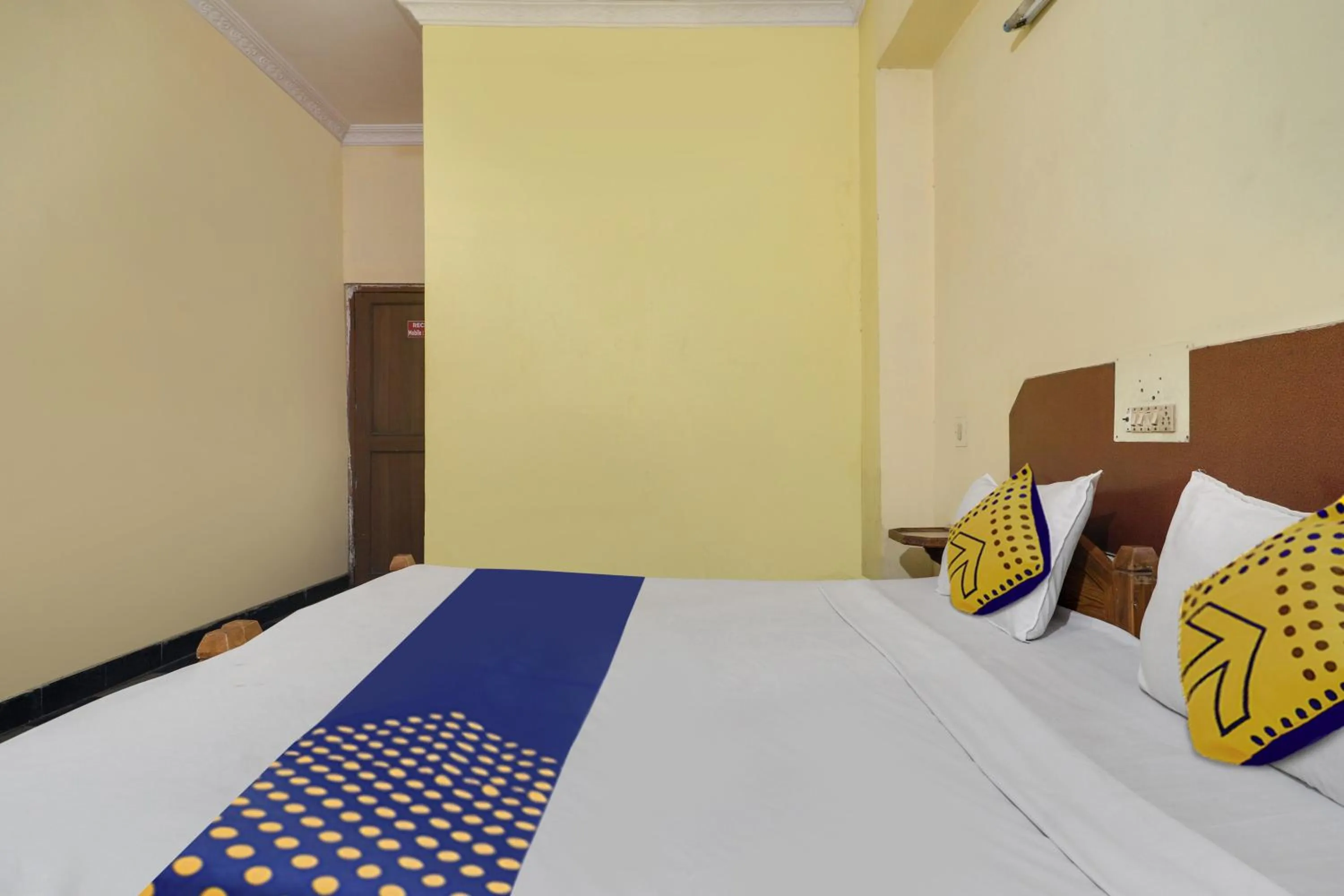 Bedroom, Bed in SPOT ON New Balaji Residency