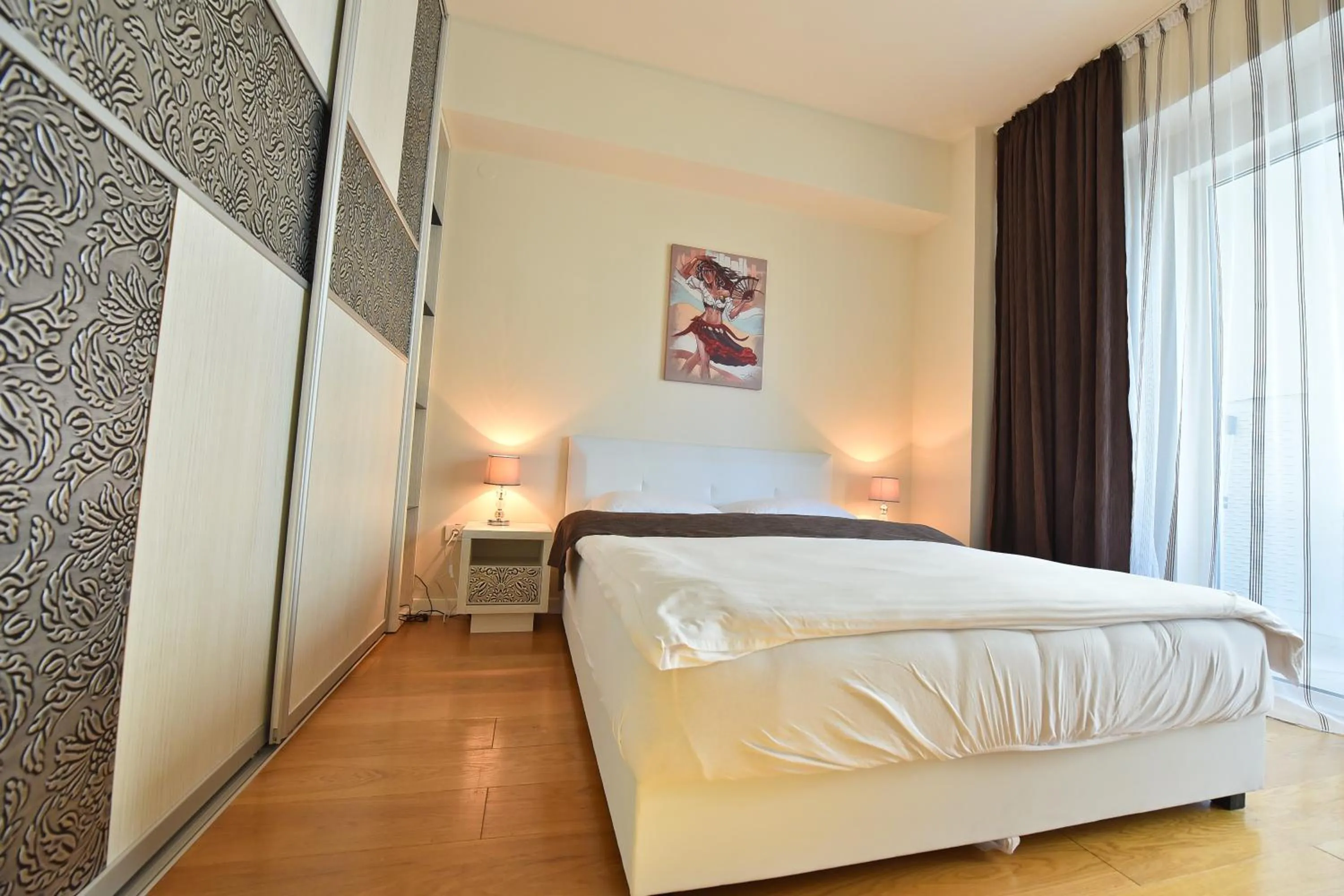 Decorative detail, Bed in Lux Apartments Sunrior