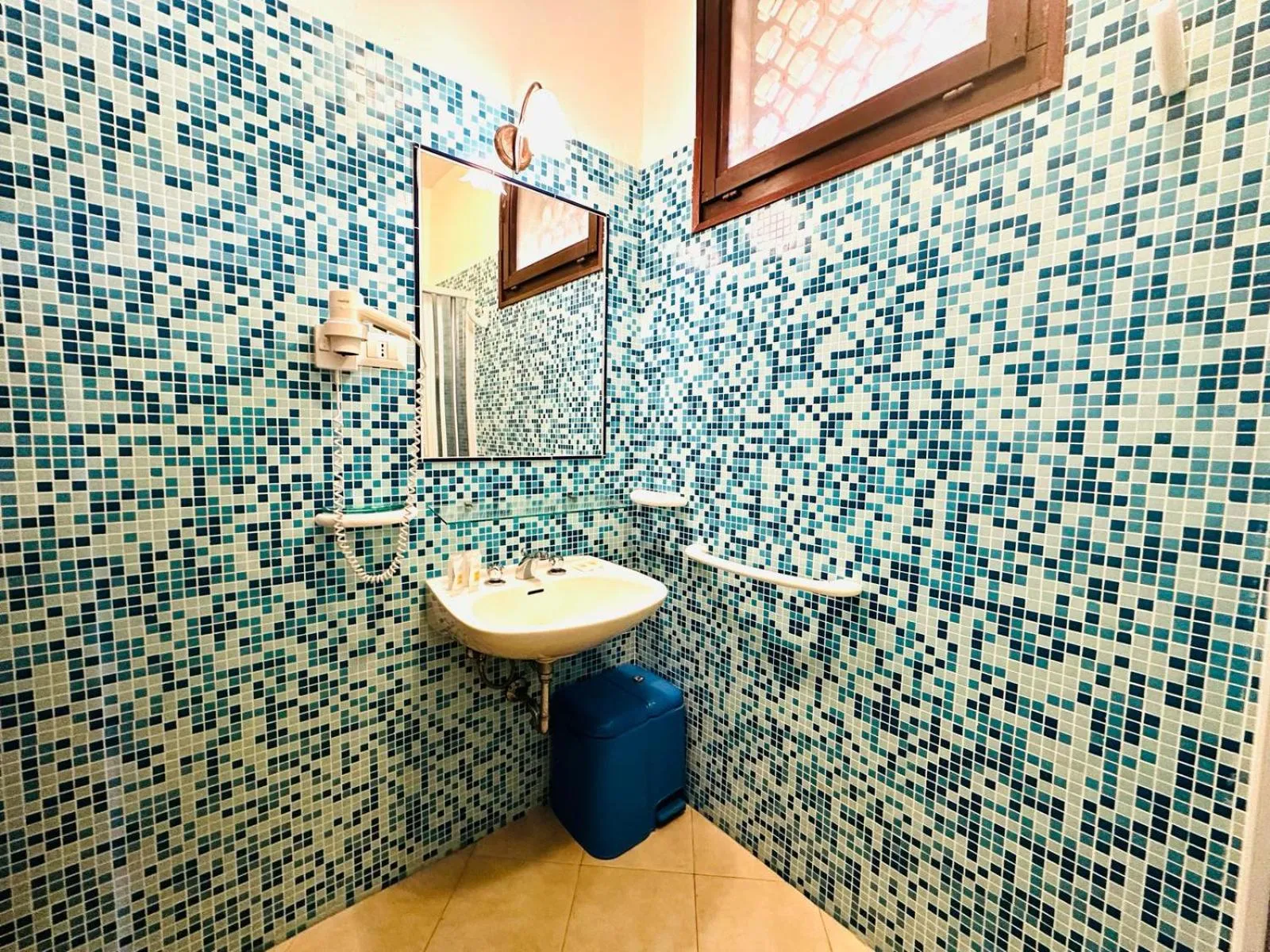 Bathroom in Residence Hotel La Pelosetta