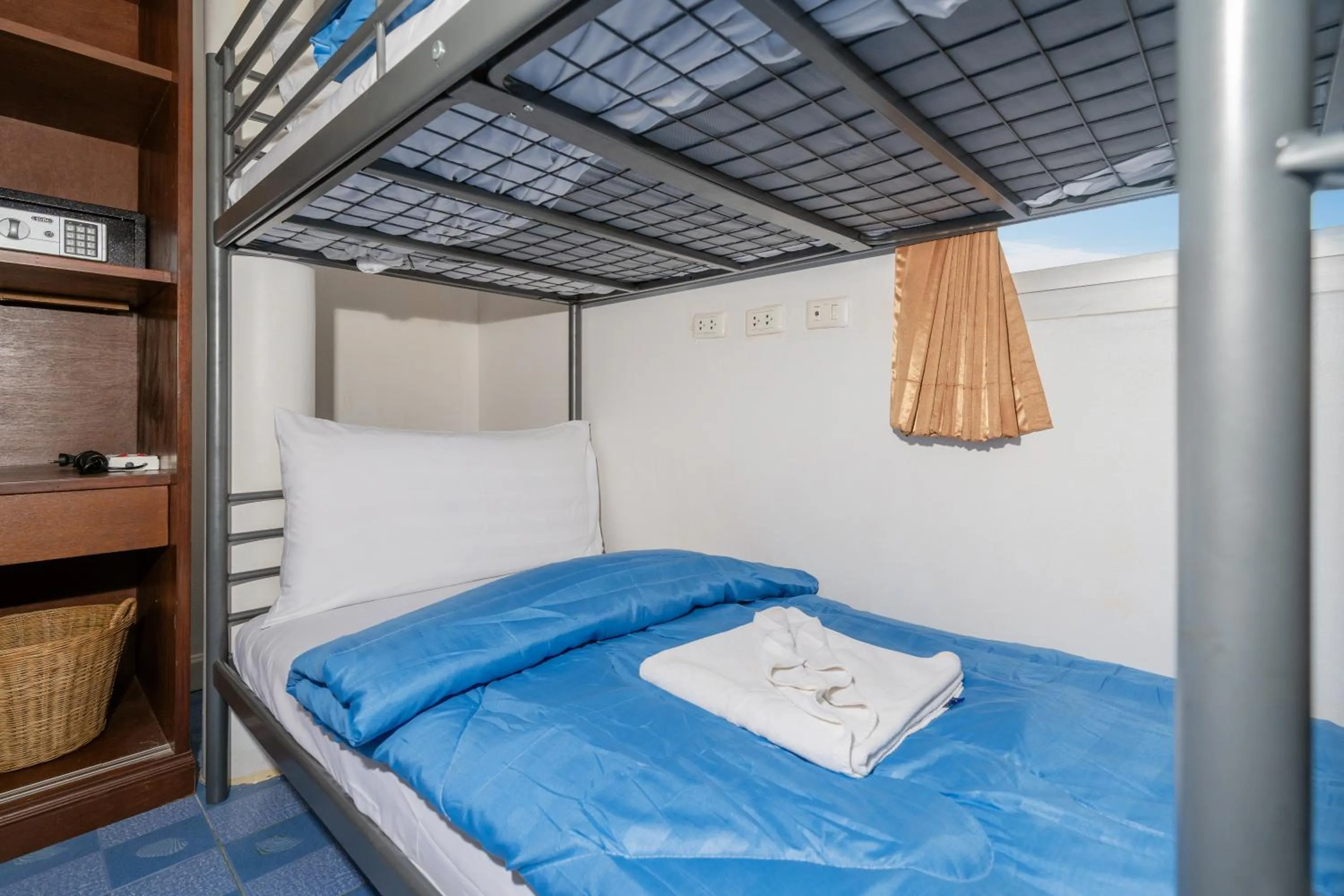 Bed in Oceanview Bungalows by EAT