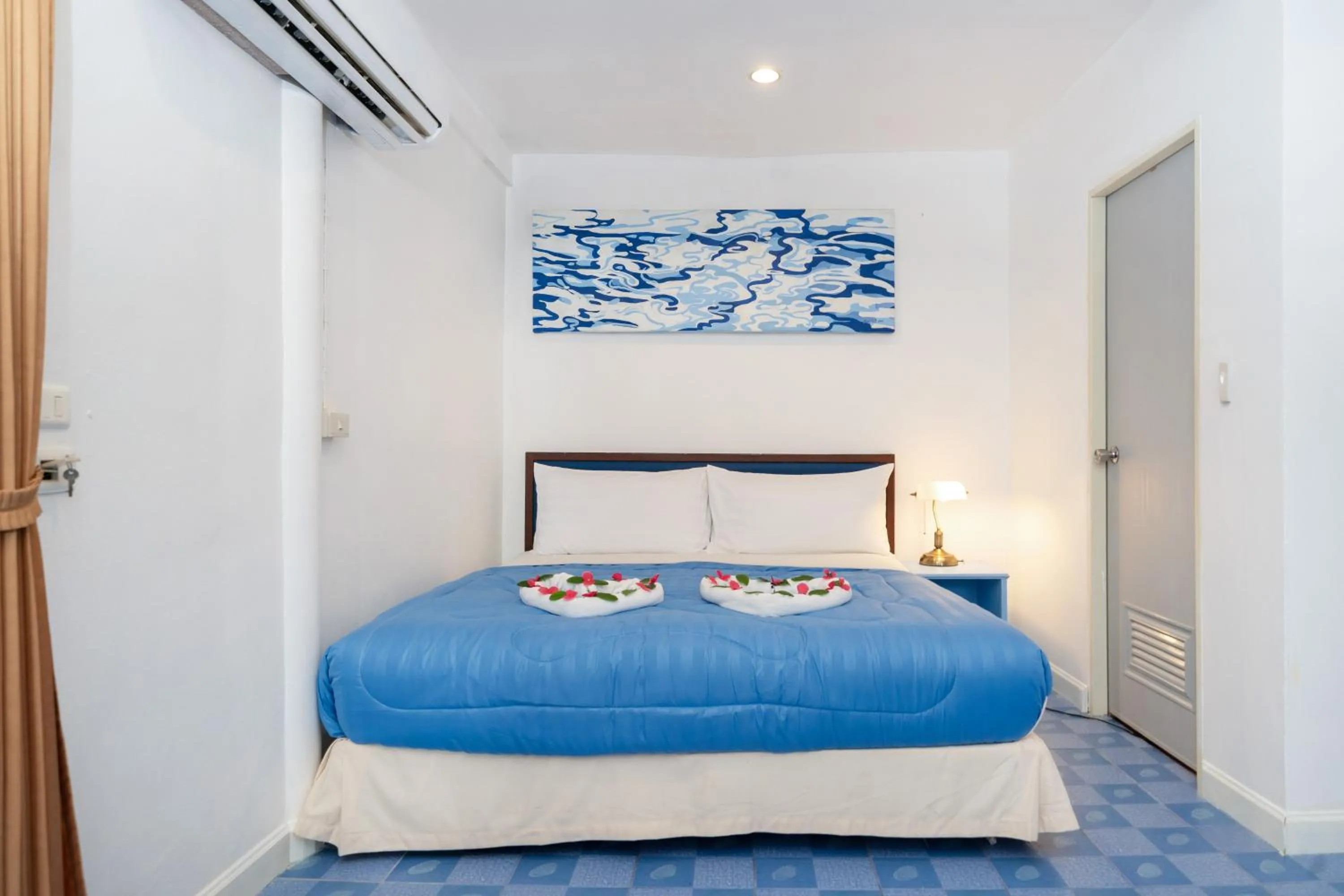 Bed in Oceanview Bungalows by EAT