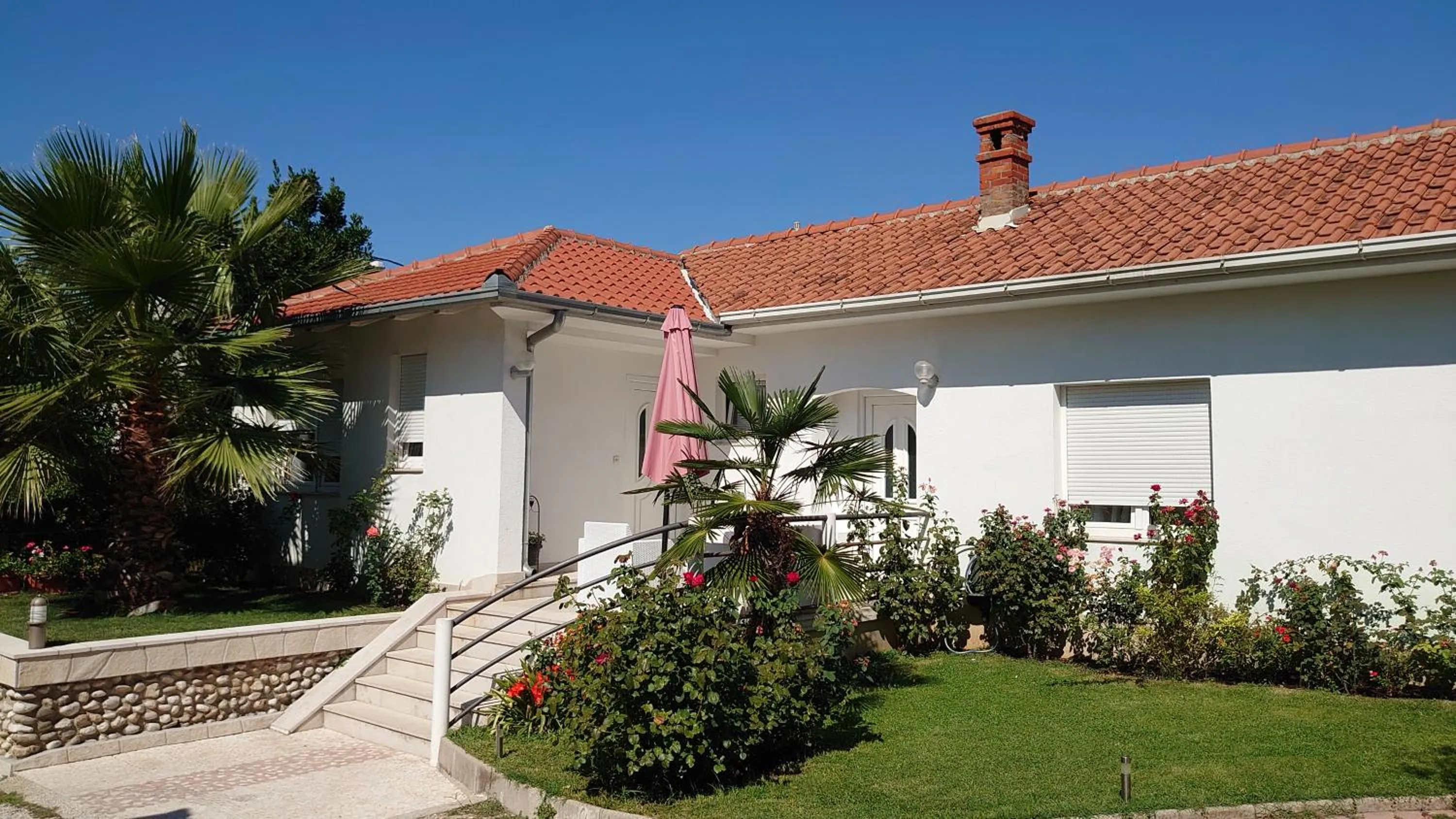 Property building in Apartments Tulipan - with free private parking garage