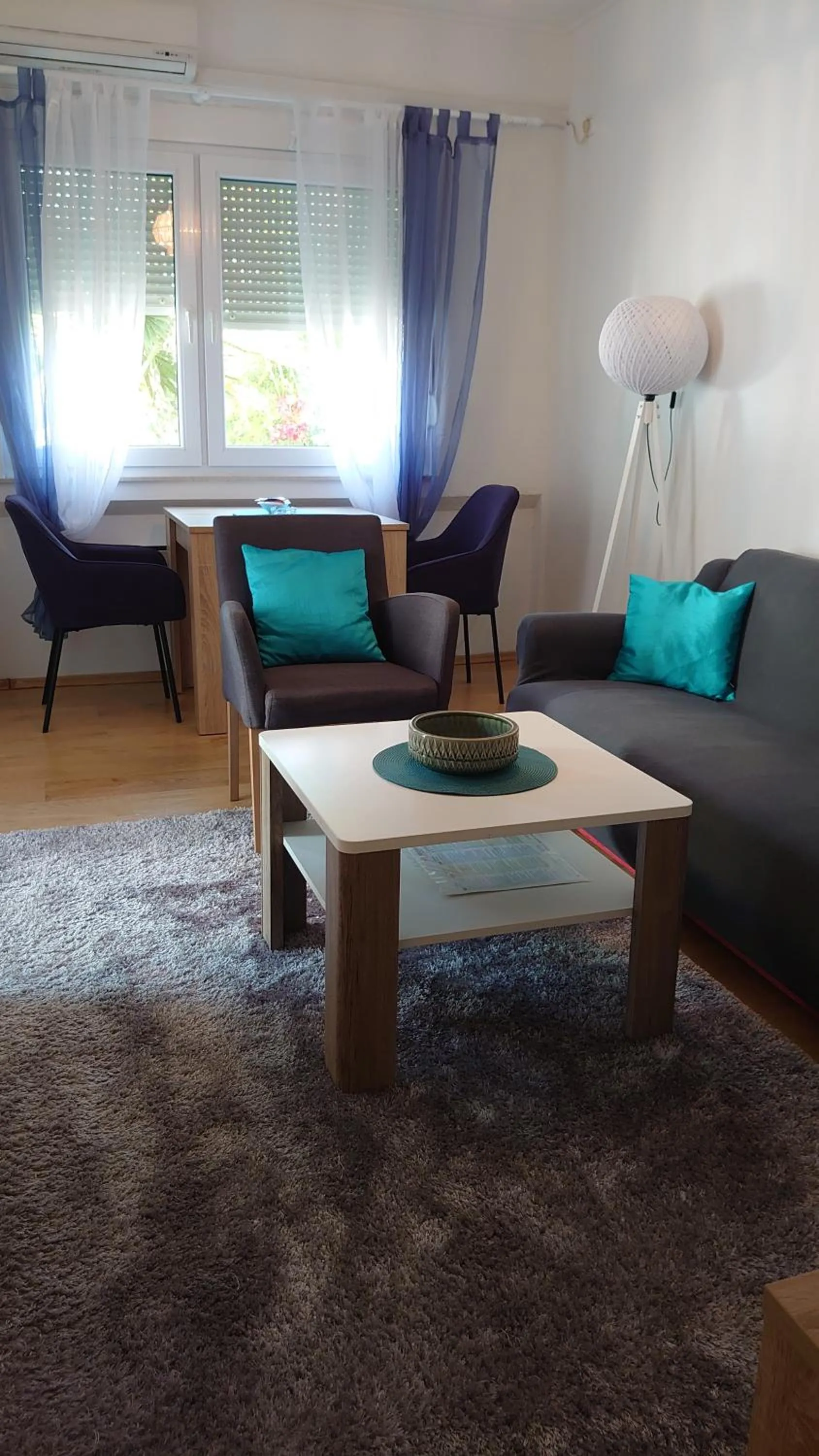 Living room in Apartments Tulipan - with free private parking garage