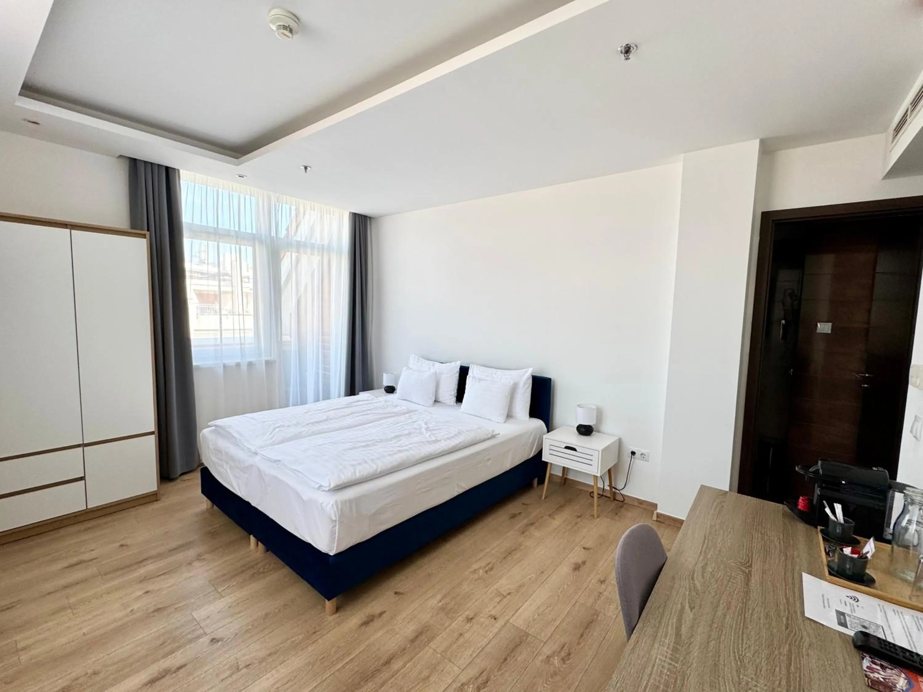 Bed in Rooftop City Residence