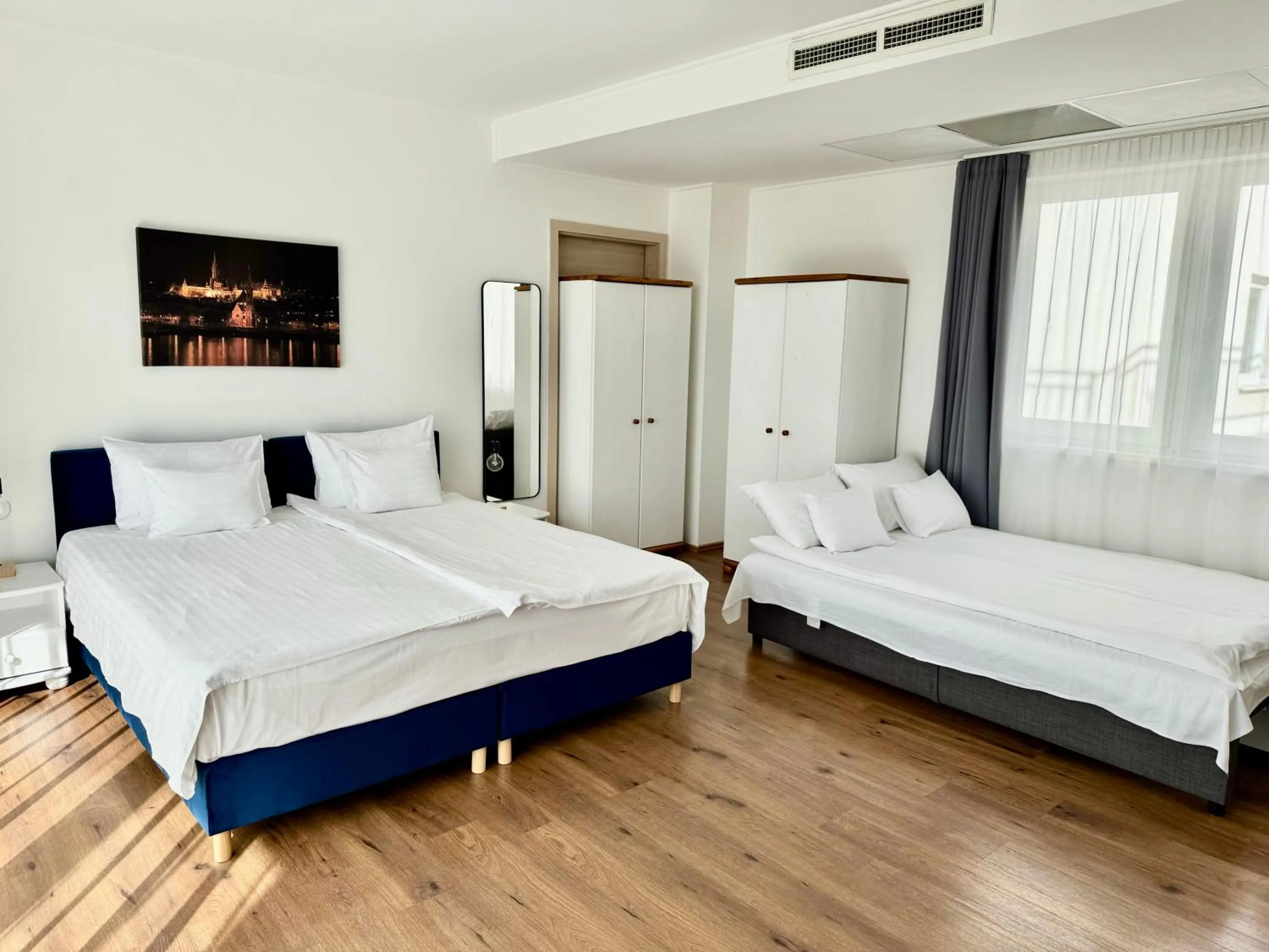 Family Room with Balcony in Rooftop City Residence