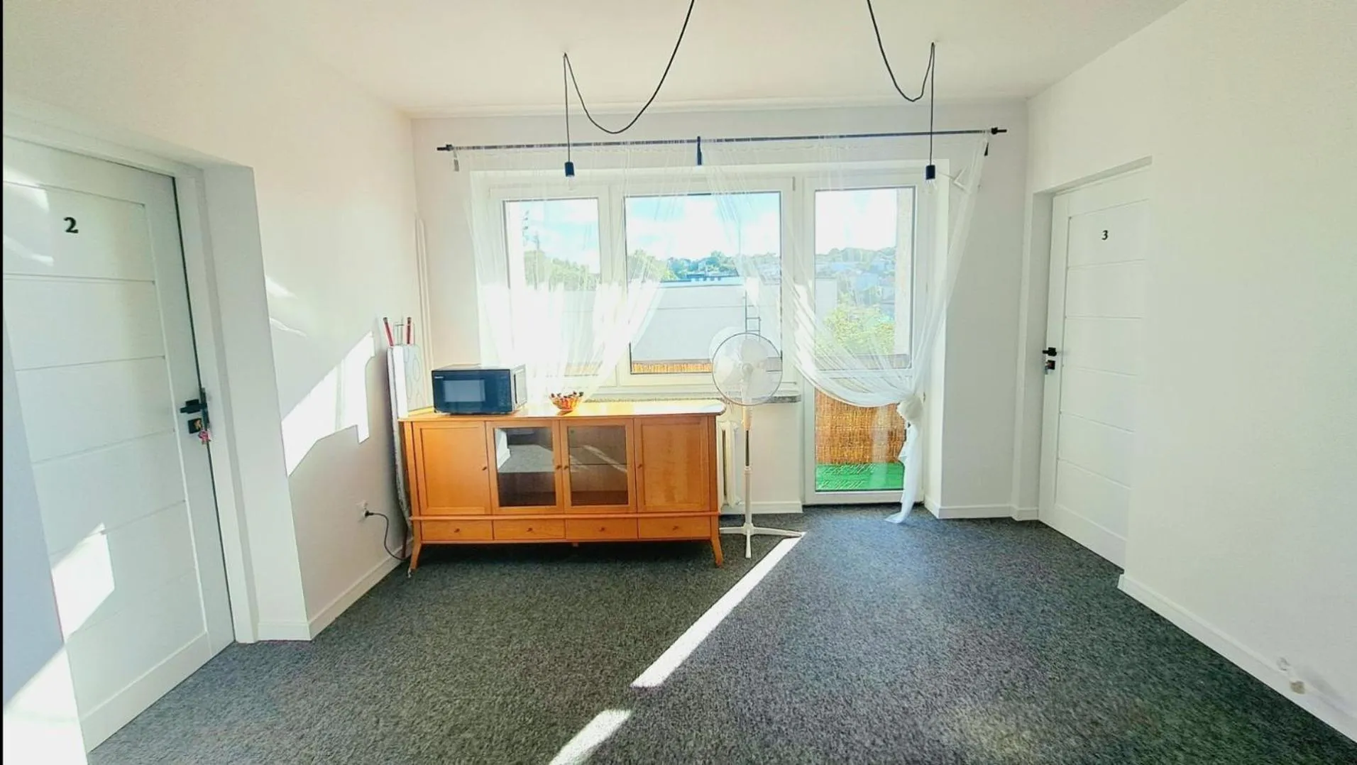 Communal lounge/ TV room in TK Apartamenty I Pokoje